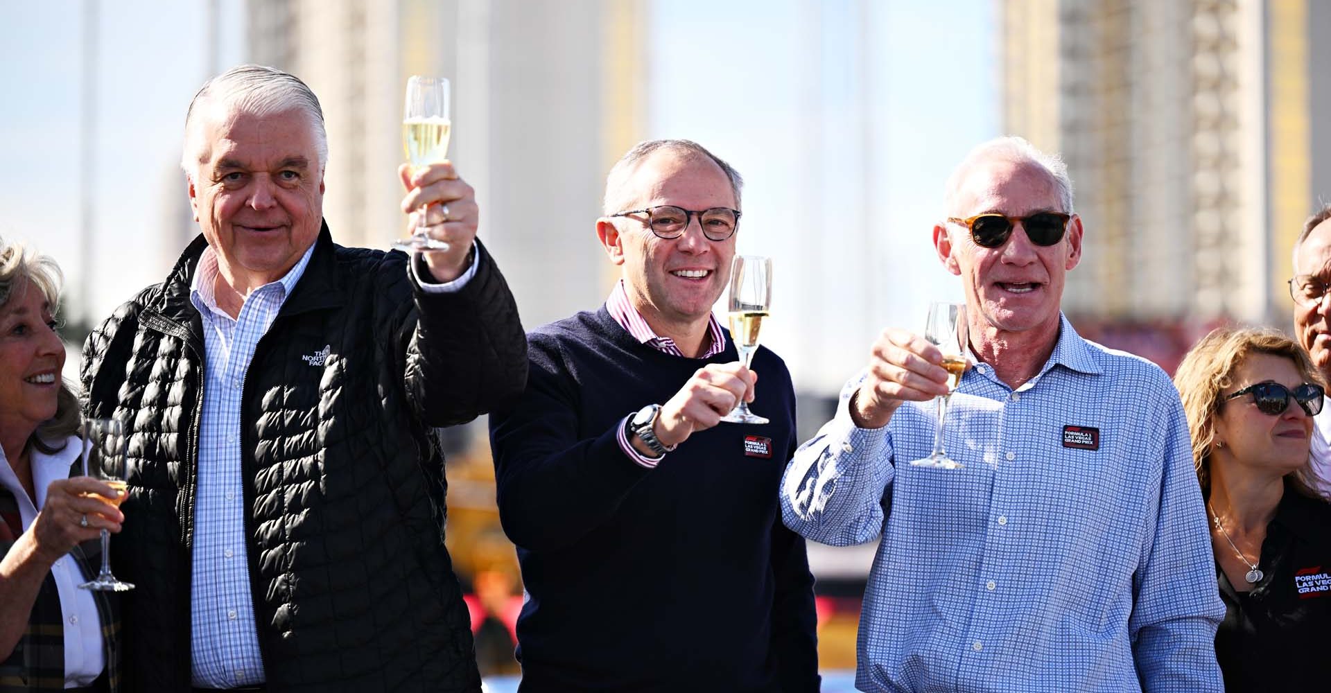 LAS VEGAS, NEVADA - NOVEMBER 05: Greg Maffei, Liberty Media President and CEO, Stefano Domenicali, President and CEO of Formula 1 and Steven Sisolak, Governor of Nevada pose for a photograph after painting the start line during the Formula 1 Las Vegas Grand Prix 2023 launch party on November 05, 2022 on the Las Vegas Strip in Las Vegas, Nevada. (Photo by Clive Mason - Formula 1/Formula 1 via Getty Images)