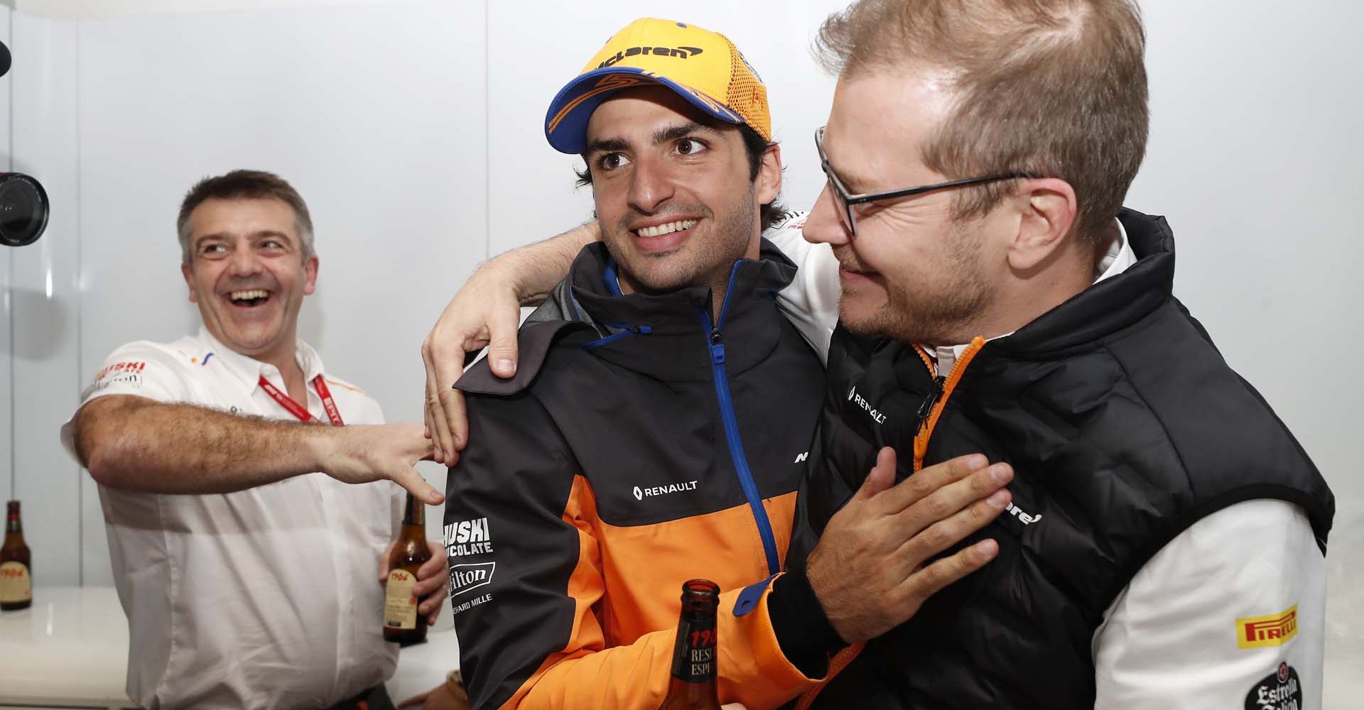 Carlos Sainz Jr, McLaren, celebrates with Andreas Seidl, Team Principal, McLaren