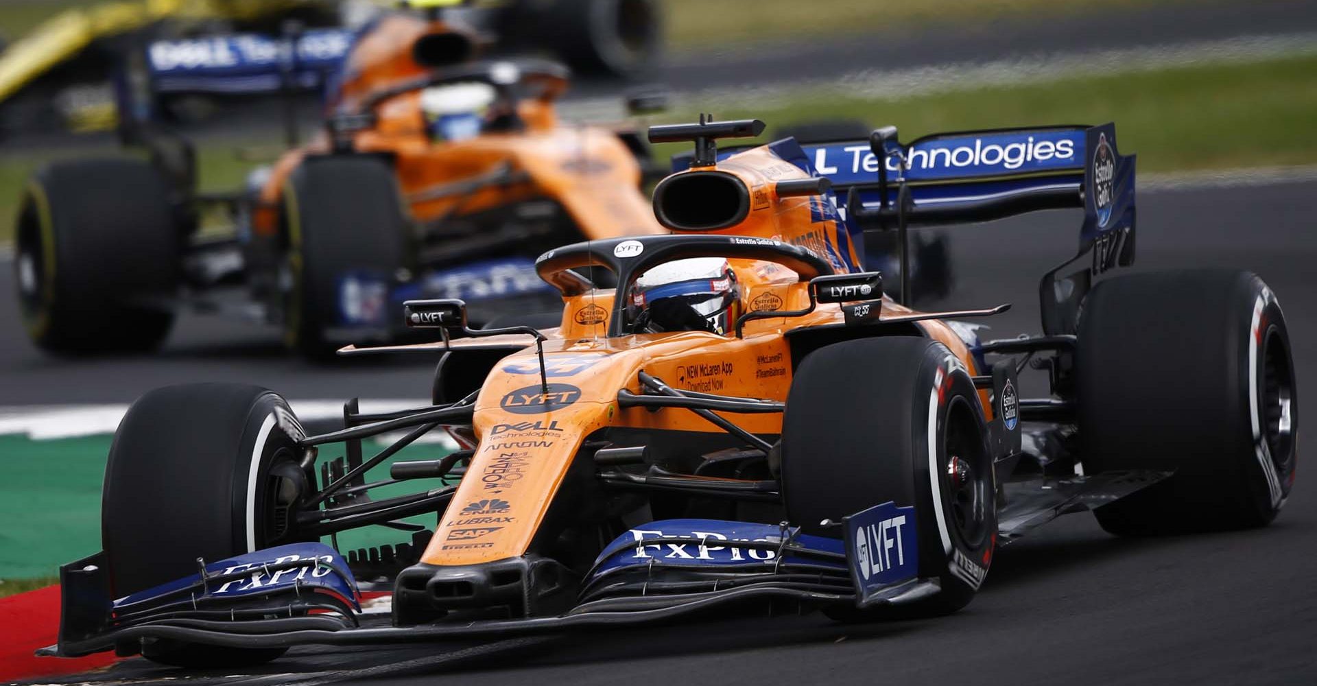 Carlos Sainz, McLaren MCL34, leads Lando Norris, McLaren MCL34