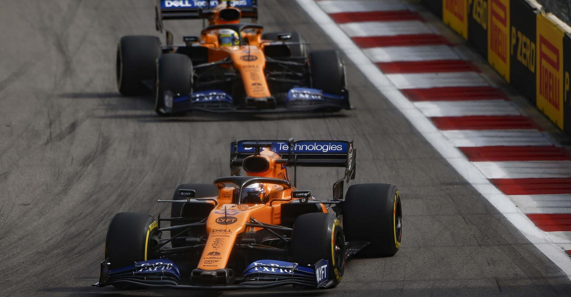 Carlos Sainz, McLaren MCL34, leads Lando Norris, McLaren MCL34