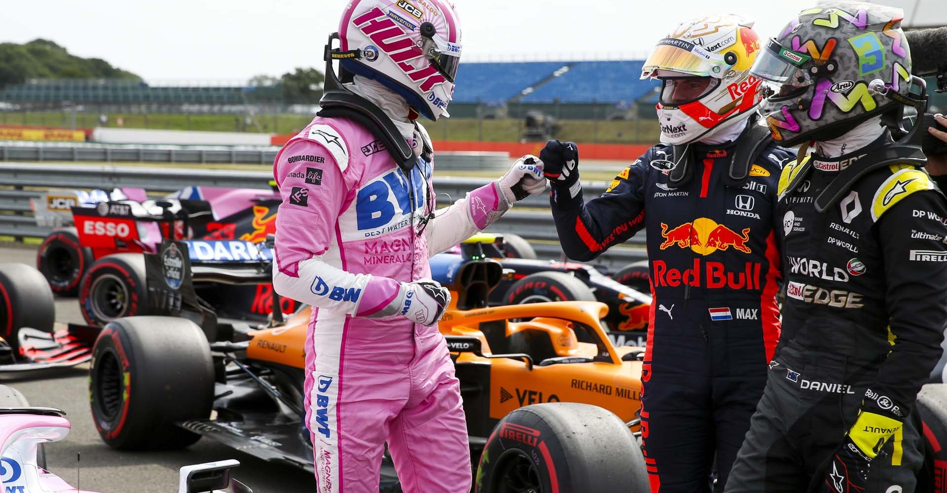 Daniel Ricciardo, Renault F1, and Max Verstappen, Red Bull Racing, congratulate Nico Hülkenberg, Racing Point RP20, in Parc Ferme after he secured third on the grid