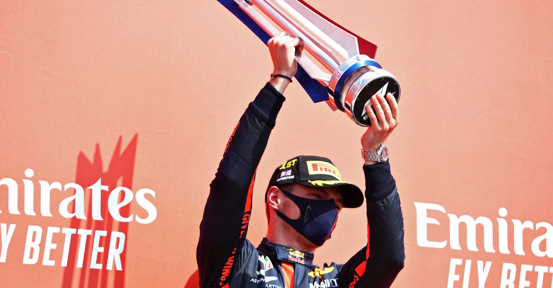 NORTHAMPTON, ENGLAND - AUGUST 09: Race winner Max Verstappen of Netherlands and Red Bull Racing celebrates on the podium during the F1 70th Anniversary Grand Prix at Silverstone on August 09, 2020 in Northampton, England. (Photo by Mark Thompson/Getty Images)