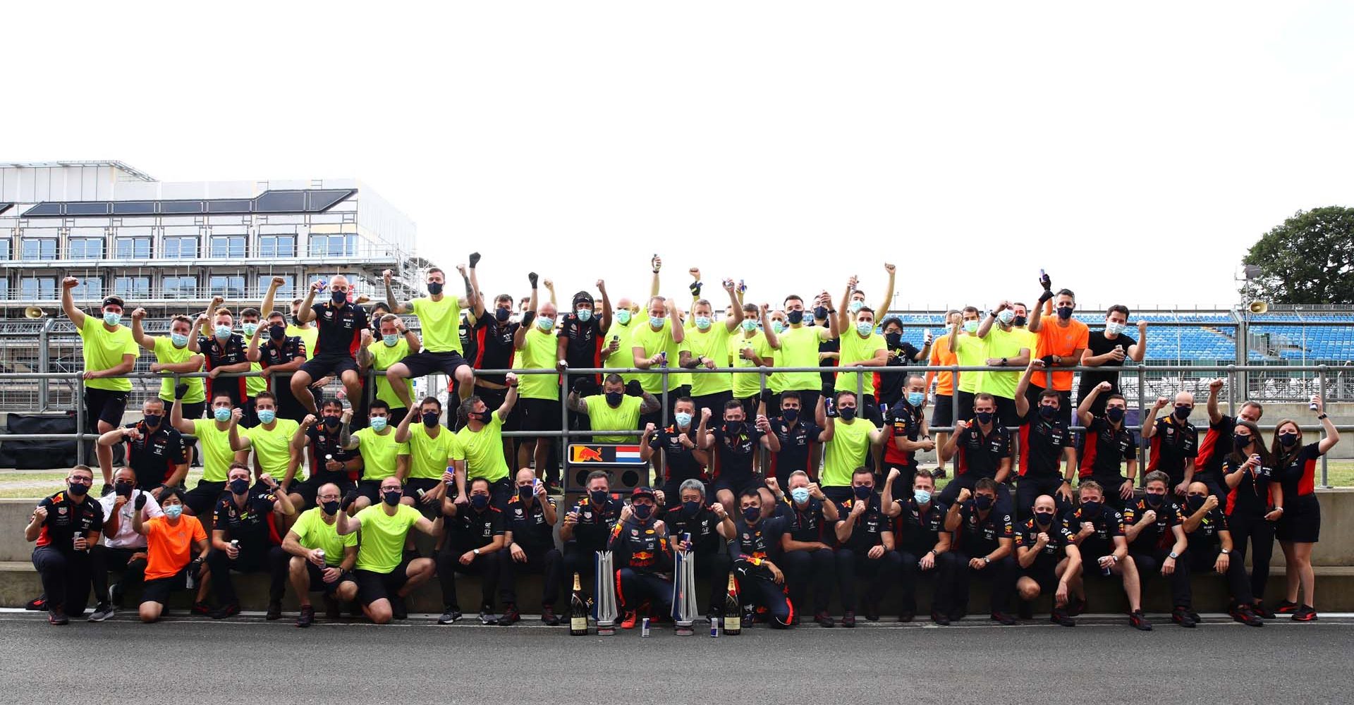 NORTHAMPTON, ENGLAND - AUGUST 09: Race winner Max Verstappen of Netherlands and Red Bull Racing celebrates with his team after the F1 70th Anniversary Grand Prix at Silverstone on August 09, 2020 in Northampton, England. (Photo by Mark Thompson/Getty Images)