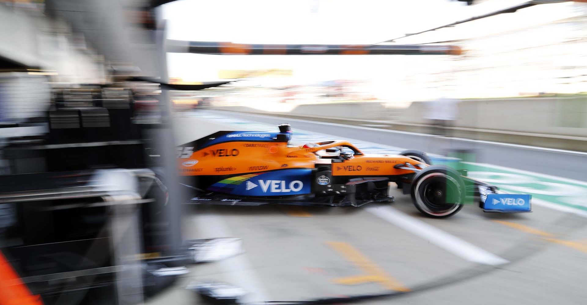 Carlos Sainz, McLaren MCL35, leaves the garage