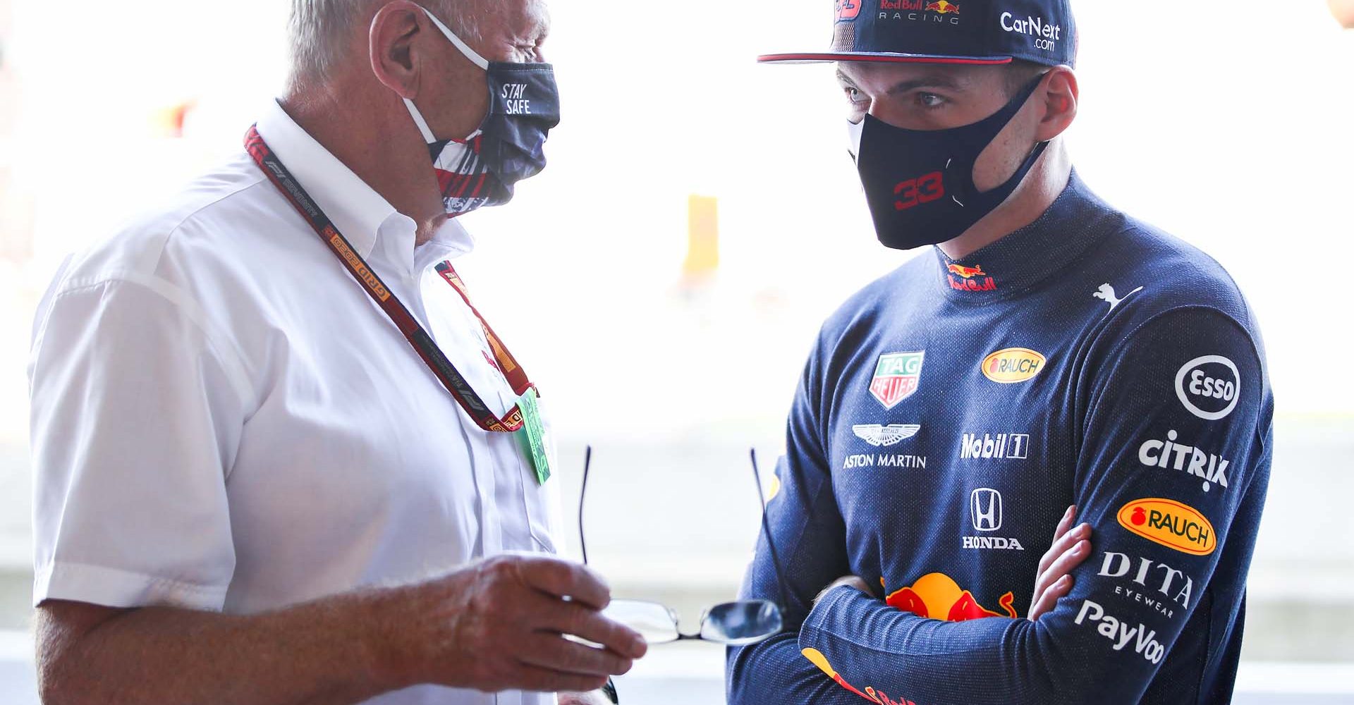 NORTHAMPTON, ENGLAND - JULY 31: Max Verstappen of Netherlands and Red Bull Racing talks with Red Bull Racing Team Consultant Dr Helmut Marko in the garage during practice for the F1 Grand Prix of Great Britain at Silverstone on July 31, 2020 in Northampton, England. (Photo by Mark Thompson/Getty Images,)