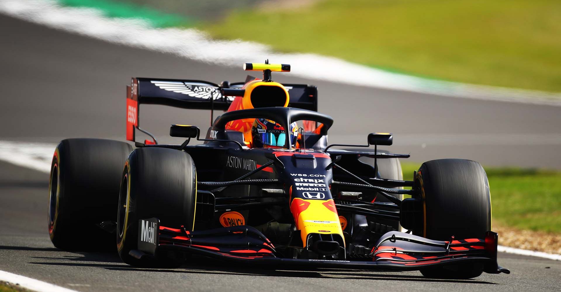 NORTHAMPTON, ENGLAND - JULY 31: Alexander Albon of Thailand driving the (23) Aston Martin Red Bull Racing RB16 on track during practice for the F1 Grand Prix of Great Britain at Silverstone on July 31, 2020 in Northampton, England. (Photo by Bryn Lennon/Getty Images)