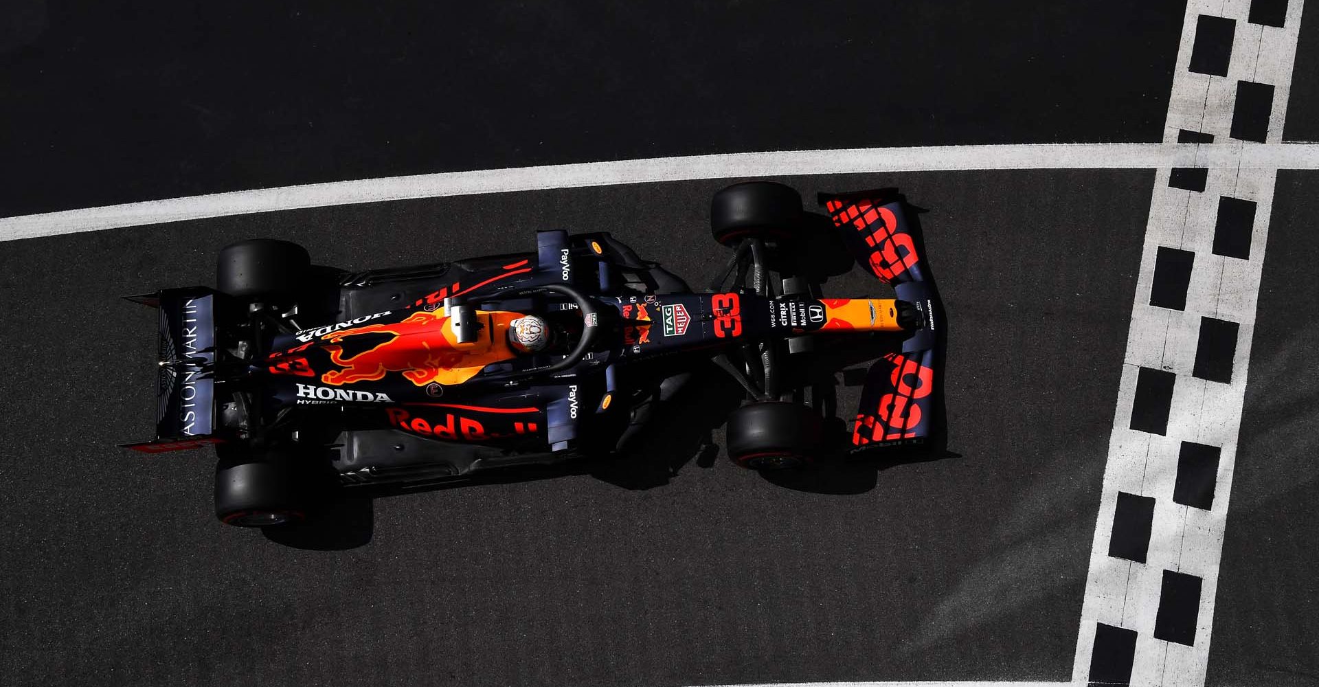 NORTHAMPTON, ENGLAND - AUGUST 01: Max Verstappen of the Netherlands driving the (33) Aston Martin Red Bull Racing RB16 comes into the pit lane during qualifying for the F1 Grand Prix of Great Britain at Silverstone on August 01, 2020 in Northampton, England. (Photo by Ben Stansall/Pool via Getty Images)