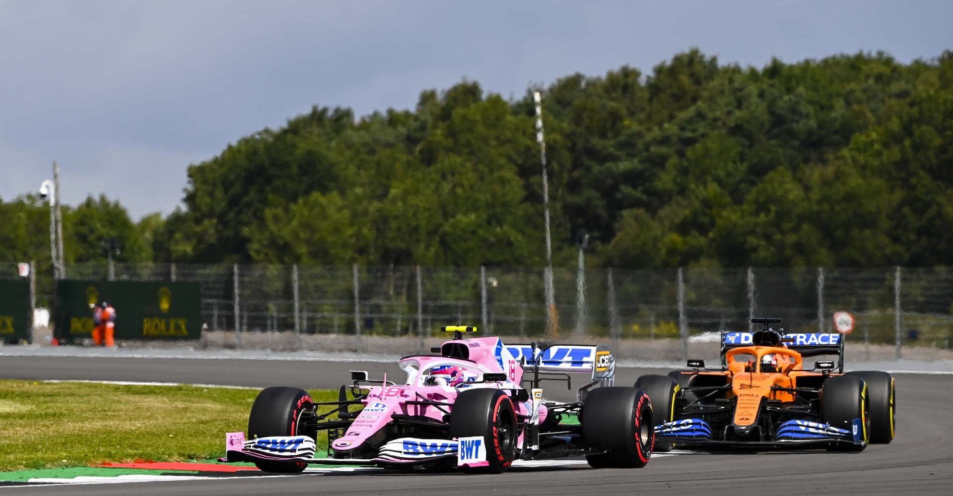 Lance Stroll, Racing Point RP20, leads Carlos Sainz, McLaren MCL35