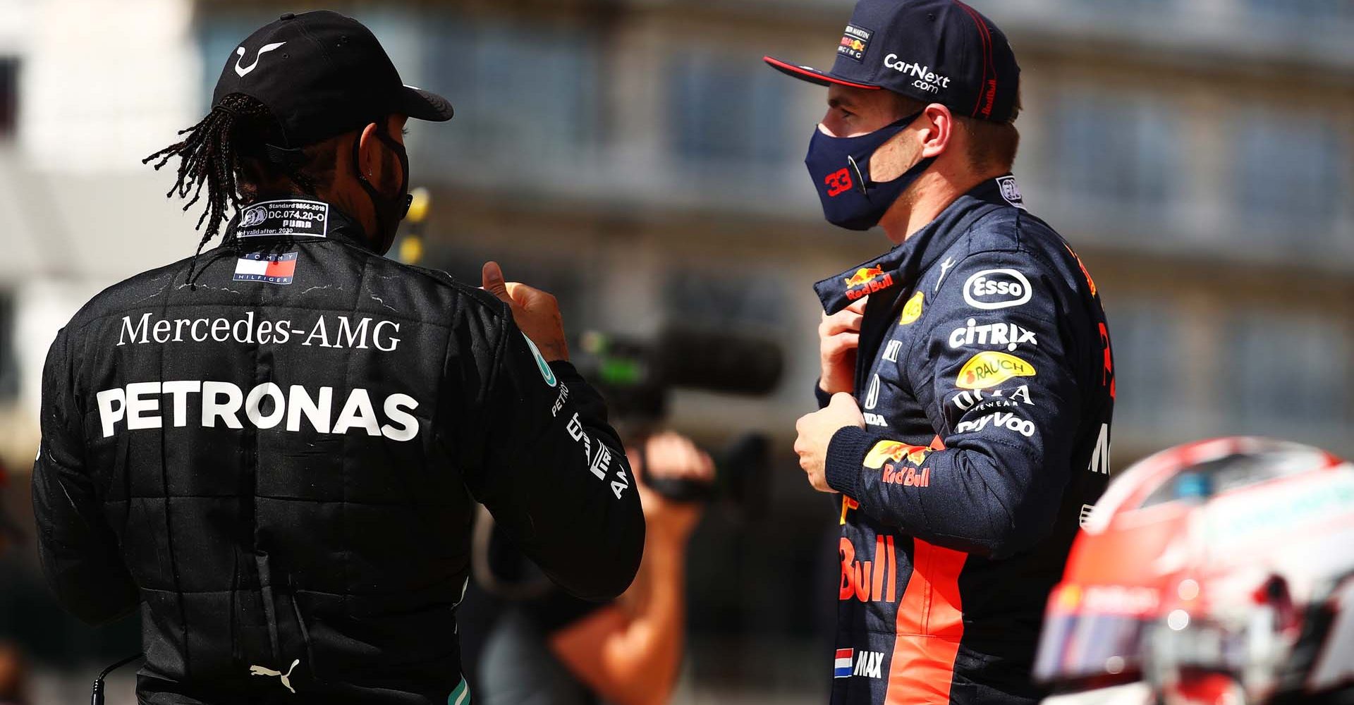 NORTHAMPTON, ENGLAND - AUGUST 02: Race winner Lewis Hamilton of Great Britain and Mercedes GP speaks with second placed Max Verstappen of Netherlands and Red Bull Racing in parc ferme during the F1 Grand Prix of Great Britain at Silverstone on August 02, 2020 in Northampton, England. (Photo by Bryn Lennon/Getty Images) // Getty Images / Red Bull Content Pool  // AP-24TQN1U852111 // Usage for editorial use only //