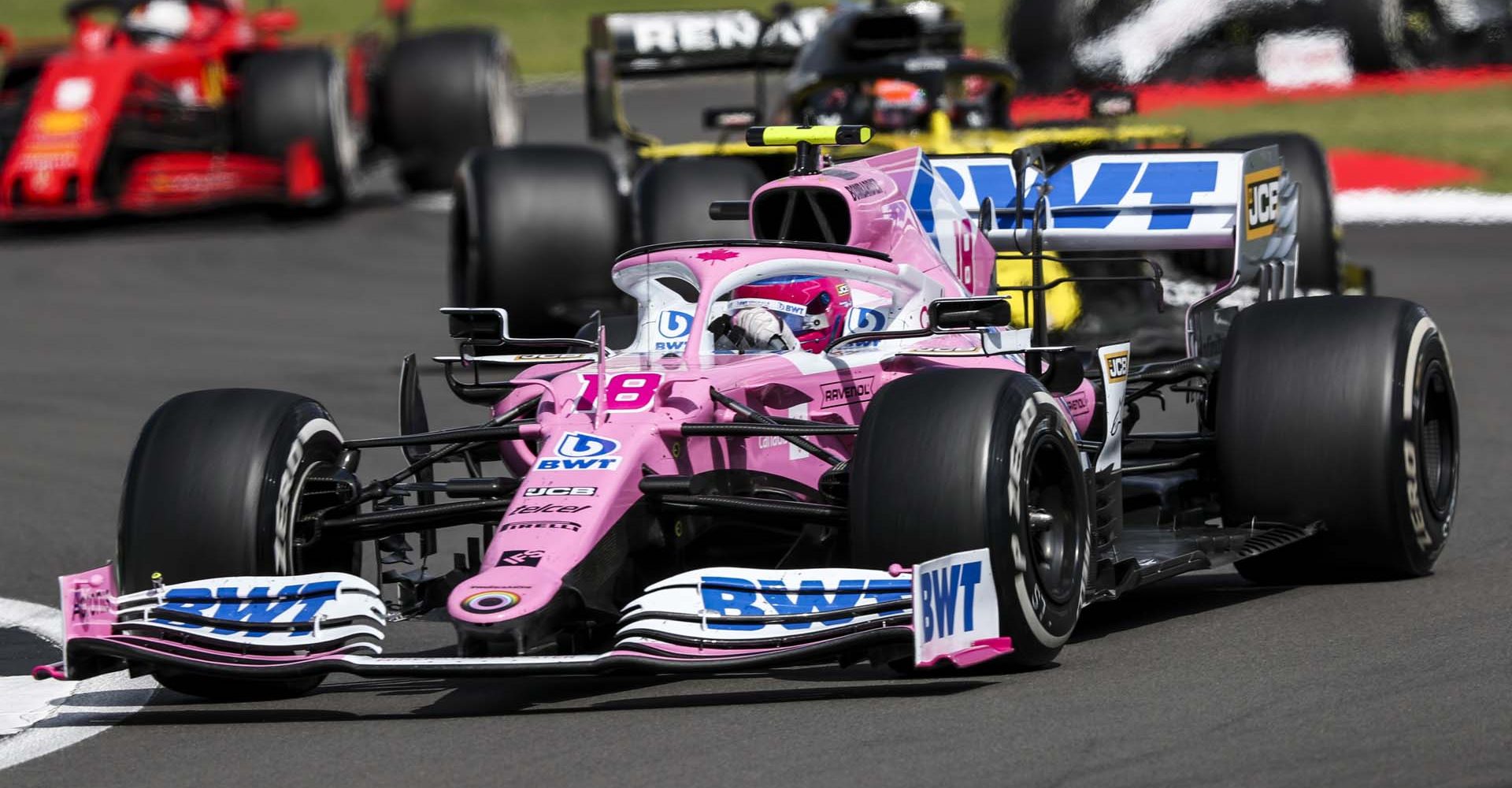 Lance Stroll, Racing Point RP20, leads Esteban Ocon, Renault R.S.20, and Sebastian Vettel, Ferrari SF1000