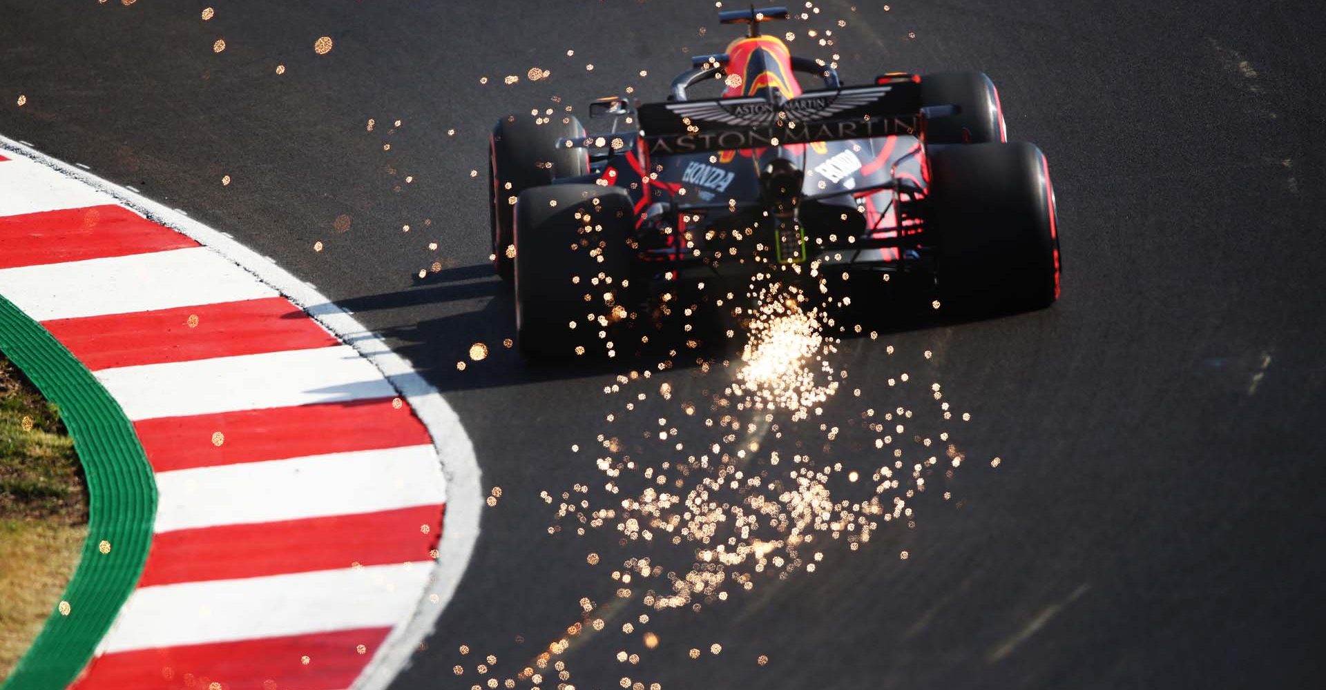 PORTIMAO, PORTUGAL - OCTOBER 24: Sparks fly from the car of Max Verstappen of the Netherlands driving the (33) Aston Martin Red Bull Racing RB16 during qualifying ahead of the F1 Grand Prix of Portugal at Autodromo Internacional do Algarve on October 24, 2020 in Portimao, Portugal. (Photo by Joe Portlock/Getty Images) beatuy