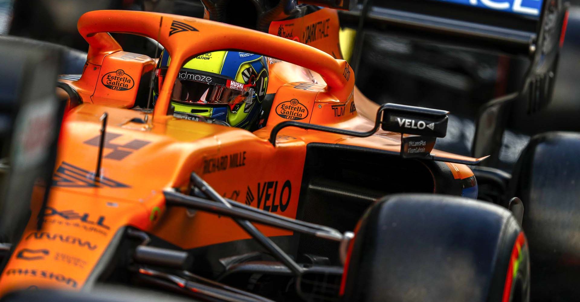 Lando Norris, McLaren MCL35, in the pit lane