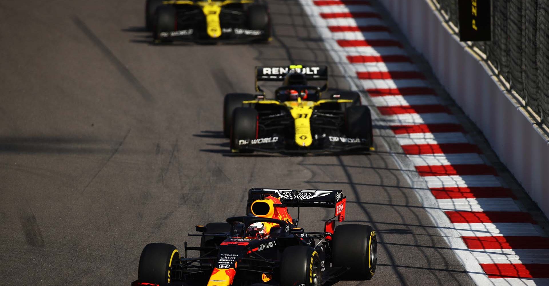 SOCHI, RUSSIA - SEPTEMBER 27: Max Verstappen of the Netherlands driving the (33) Aston Martin Red Bull Racing RB16 leads Esteban Ocon of France driving the (31) Renault Sport Formula One Team RS20 and Daniel Ricciardo of Australia driving the (3) Renault Sport Formula One Team RS20 during the F1 Grand Prix of Russia at Sochi Autodrom on September 27, 2020 in Sochi, Russia. (Photo by Bryn Lennon/Getty Images)