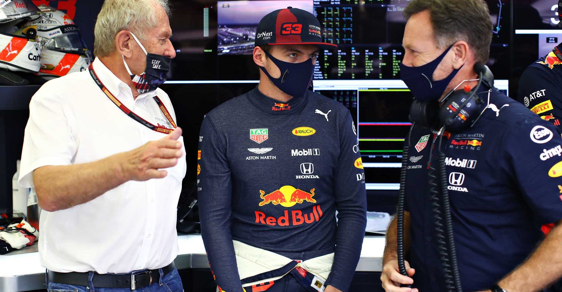 BAHRAIN, BAHRAIN - DECEMBER 05: Red Bull Racing Team Consultant Dr Helmut Marko, Max Verstappen of Netherlands and Red Bull Racing and Red Bull Racing Team Principal Christian Horner talk in the garage during final practice ahead of the F1 Grand Prix of Sakhir at Bahrain International Circuit on December 05, 2020 in Bahrain, Bahrain. (Photo by Mark Thompson/Getty Images)