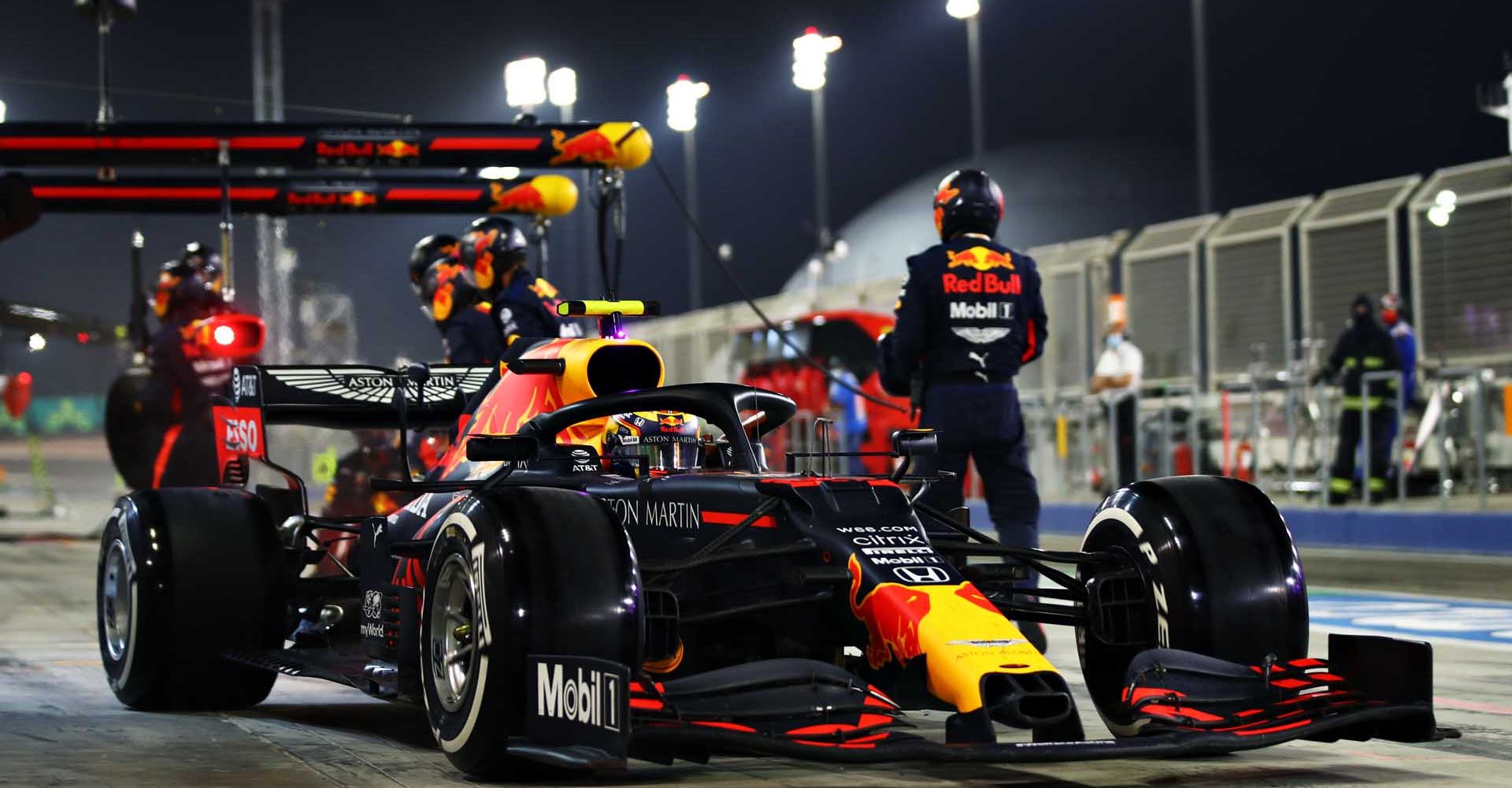 BAHRAIN, BAHRAIN - DECEMBER 06: Alexander Albon of Thailand driving the (23) Aston Martin Red Bull Racing RB16 makes a pitstop during the F1 Grand Prix of Sakhir at Bahrain International Circuit on December 06, 2020 in Bahrain, Bahrain. (Photo by Mark Thompson/Getty Images)