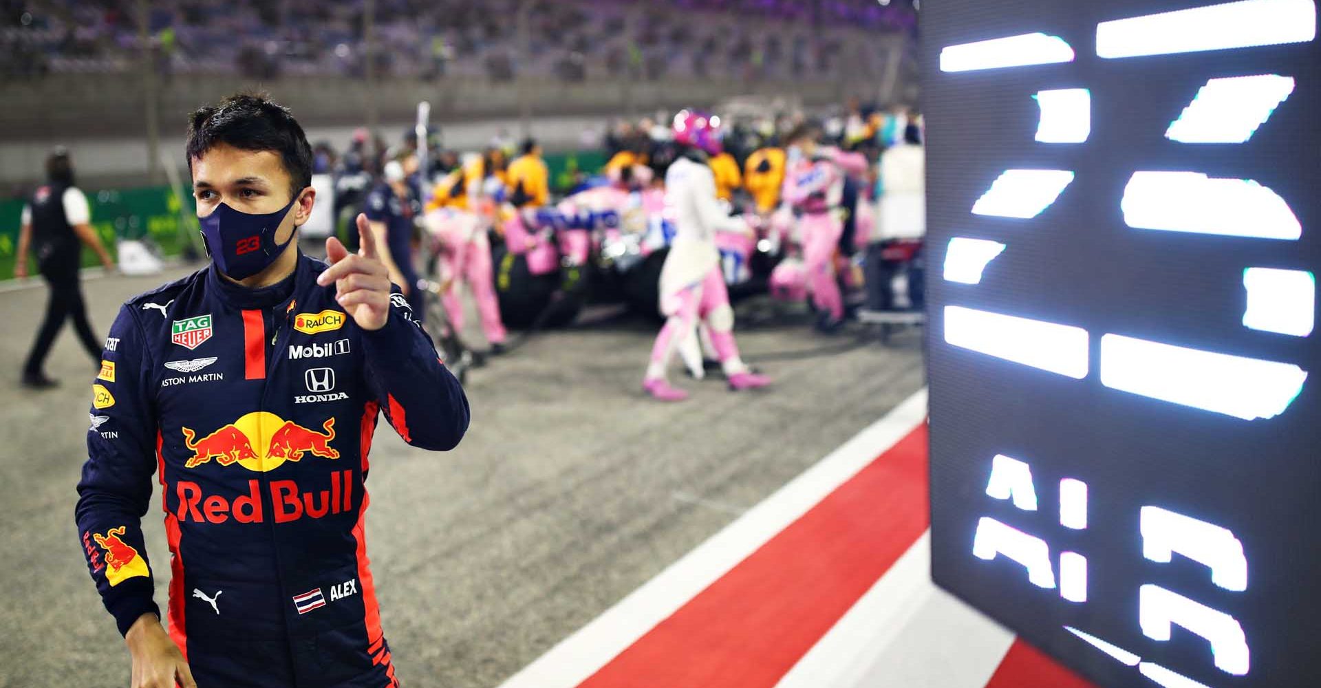 BAHRAIN, BAHRAIN - DECEMBER 06: Alexander Albon of Thailand and Red Bull Racing prepares to drive on the grid before the F1 Grand Prix of Sakhir at Bahrain International Circuit on December 06, 2020 in Bahrain, Bahrain. (Photo by Mark Thompson/Getty Images)