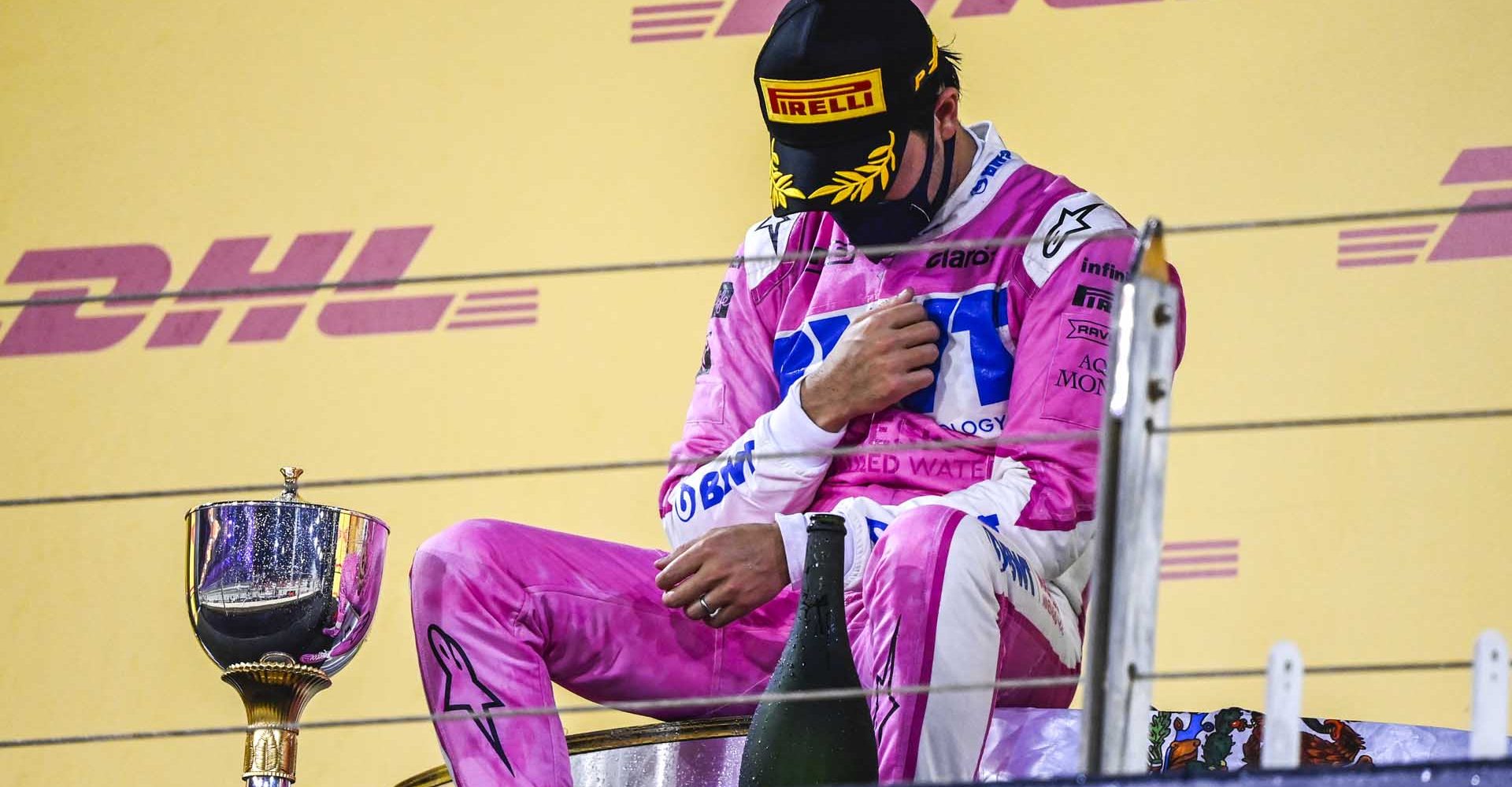 Sergio Perez, Racing Point, 1st position, contemplates on the podium