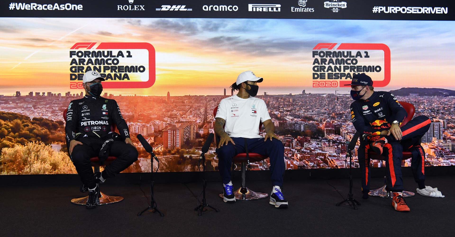 BARCELONA, SPAIN - AUGUST 15: (L-R) Second placed qualifier Valtteri Bottas of Finland and Mercedes GP, Pole position qualifier Lewis Hamilton of Great Britain and Mercedes GP and third placed qualifier Max Verstappen of Netherlands and Red Bull Racing talk in a press conference after qualifying for the F1 Grand Prix of Spain at Circuit de Barcelona-Catalunya on August 15, 2020 in Barcelona, Spain. (Photo by Rudy Carezzevoli/Getty Images)