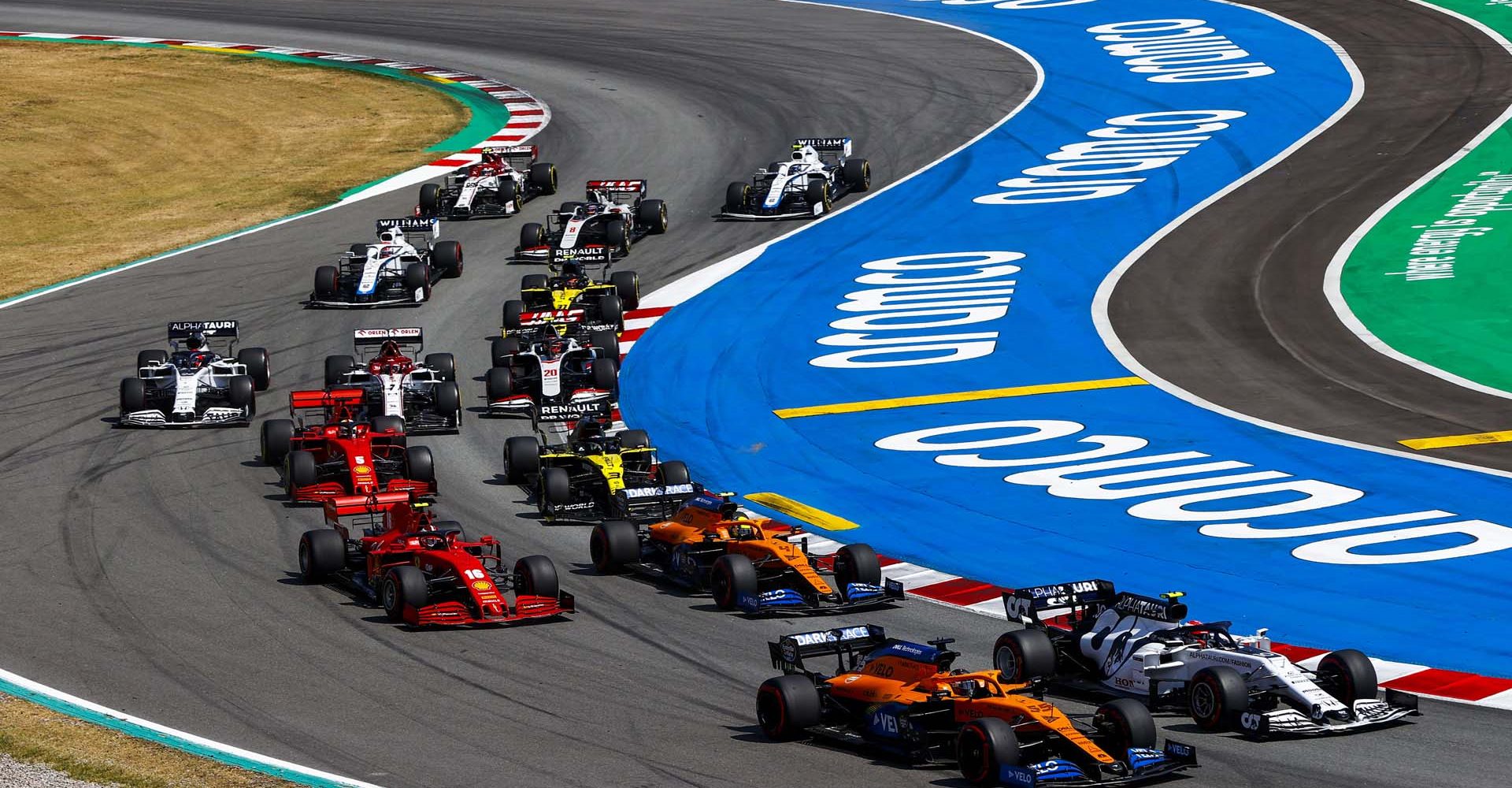 Carlos Sainz, McLaren MCL35, leads Pierre Gasly, AlphaTauri AT01, Lando Norris, McLaren MCL35, Charles Leclerc, Ferrari SF1000, Daniel Ricciardo, Renault R.S.20, Sebastian Vettel, Ferrari SF1000, and the remainder of the field at the start