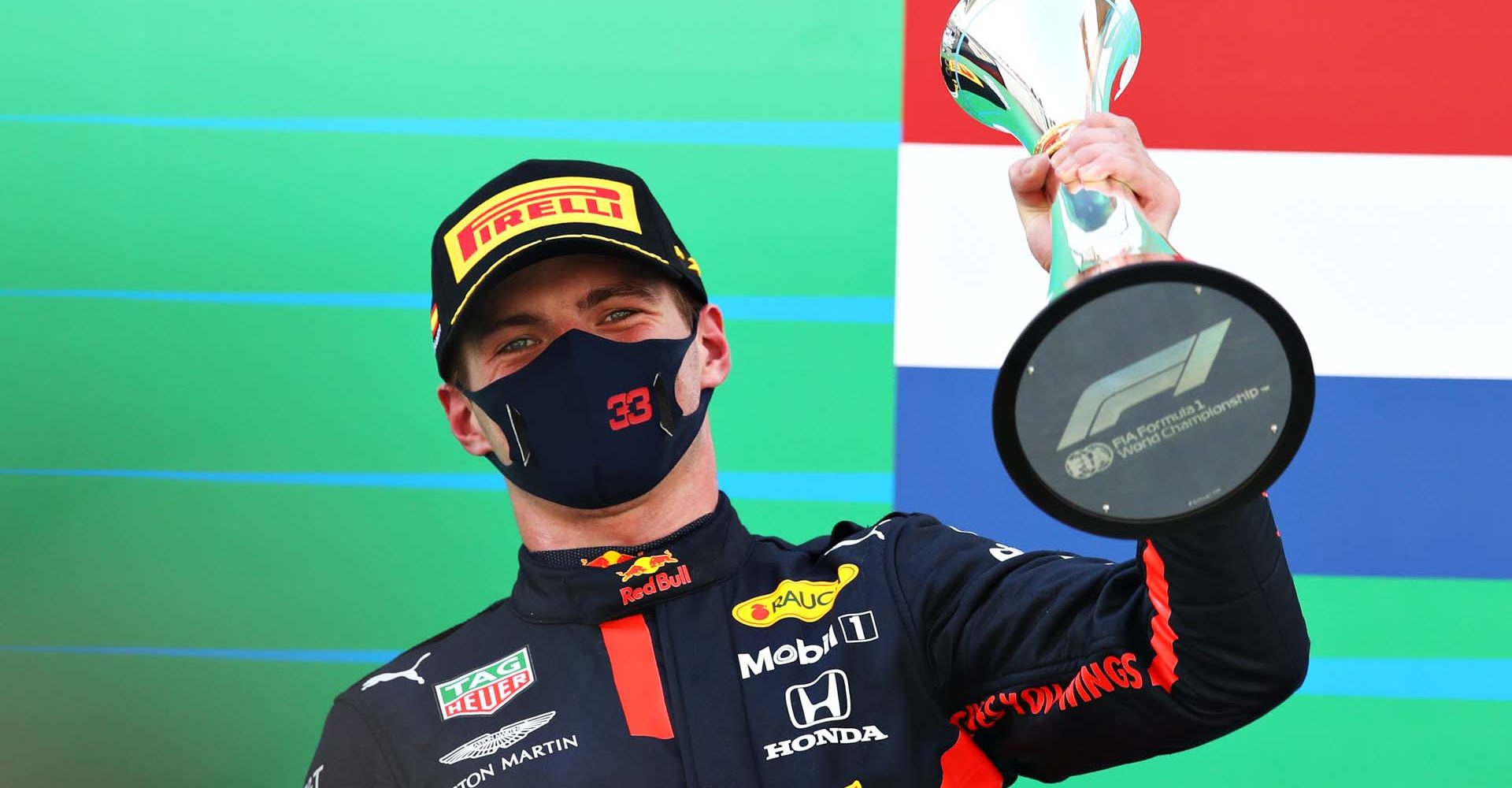 BARCELONA, SPAIN - AUGUST 16: Second placed Max Verstappen of Netherlands and Red Bull Racing celebrates on the podium during the F1 Grand Prix of Spain at Circuit de Barcelona-Catalunya on August 16, 2020 in Barcelona, Spain. (Photo by Mark Thompson/Getty Images)