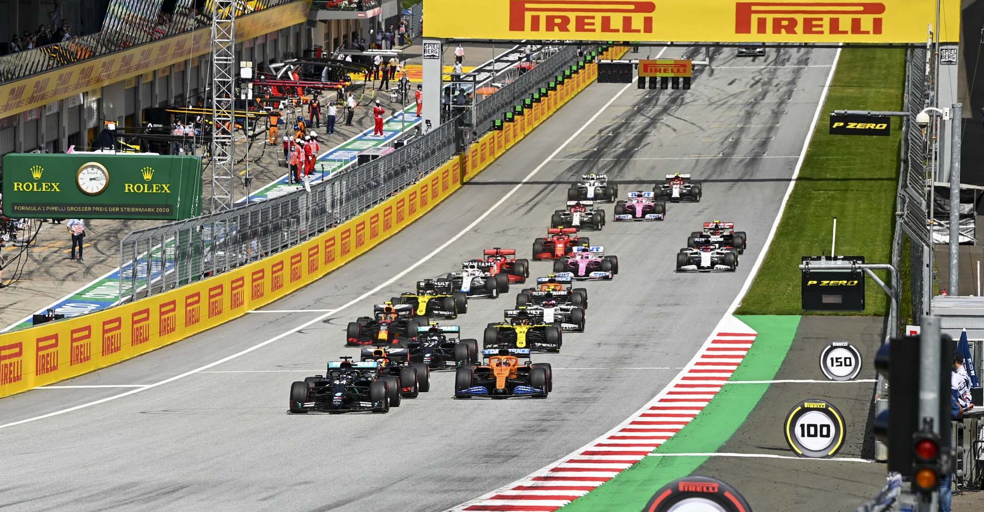 RED BULL RING, AUSTRIA - JULY 12: Lewis Hamilton, Mercedes-AMG Petronas F1 leads Max Verstappen, Red Bull Racing RB16 and Carlos Sainz, McLaren MCL35 at the start of the race during the Styrian GP at Red Bull Ring on Sunday July 12, 2020 in Spielberg, Austria. (Photo by Mark Sutton / LAT Images)