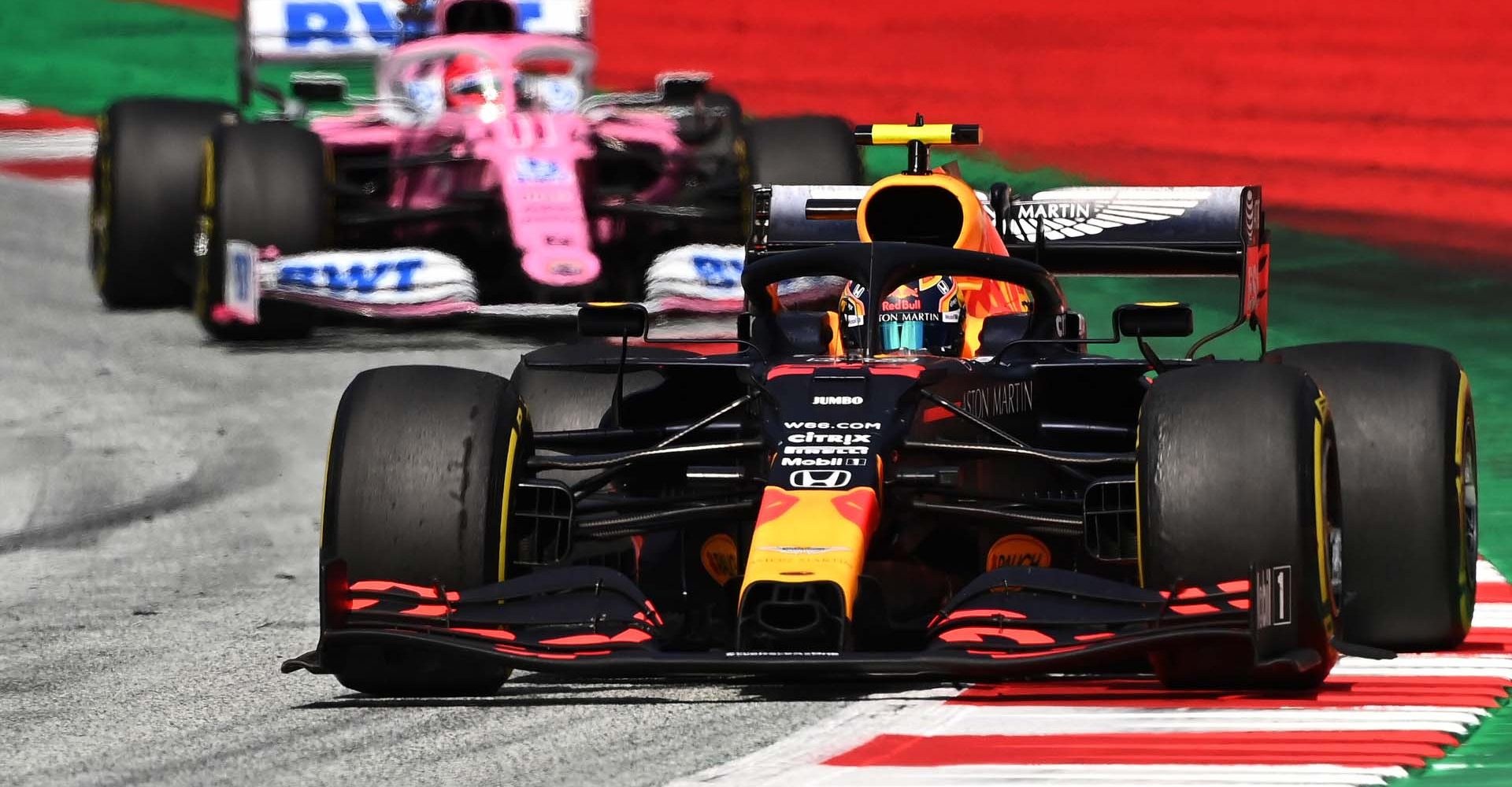 SPIELBERG, AUSTRIA - JULY 12: Alexander Albon of Thailand driving the (23) Aston Martin Red Bull Racing RB16 leads Sergio Perez of Mexico driving the (11) Racing Point RP20 Mercedes during the Formula One Grand Prix of Styria at Red Bull Ring on July 12, 2020 in Spielberg, Austria. (Photo by Joe Klamar/Pool via Getty Images) // Getty Images / Red Bull Content Pool  // AP-24KXT8RVW1W11 // Usage for editorial use only //