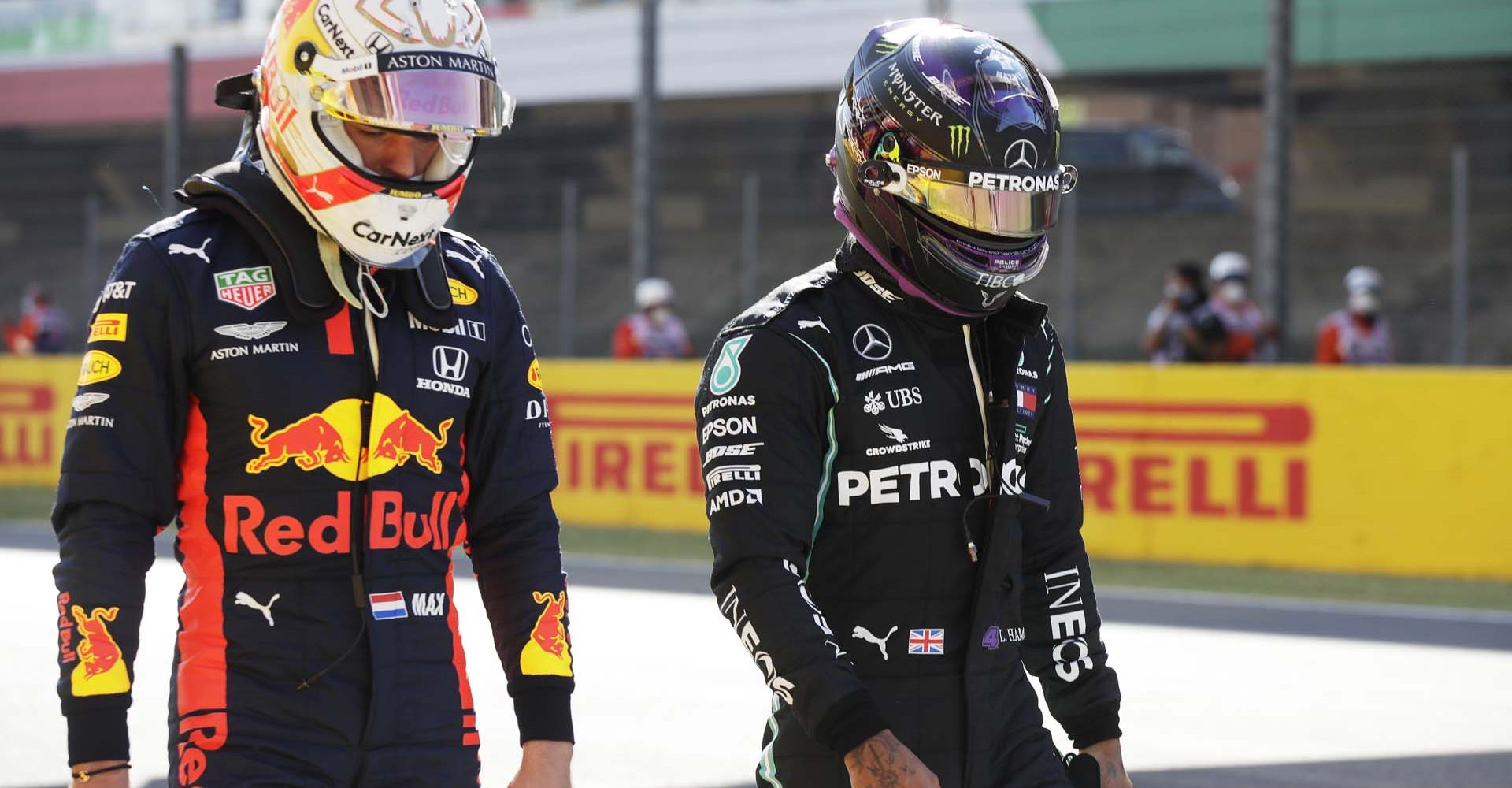 SCARPERIA, ITALY - SEPTEMBER 12: Pole position qualifier Lewis Hamilton of Great Britain and Mercedes GP and third placed qualifier Max Verstappen of Netherlands and Red Bull Racing in parc ferme during qualifying for the F1 Grand Prix of Tuscany at Mugello Circuit on September 12, 2020 in Scarperia, Italy. (Photo by Luca Bruno - Pool/Getty Images)