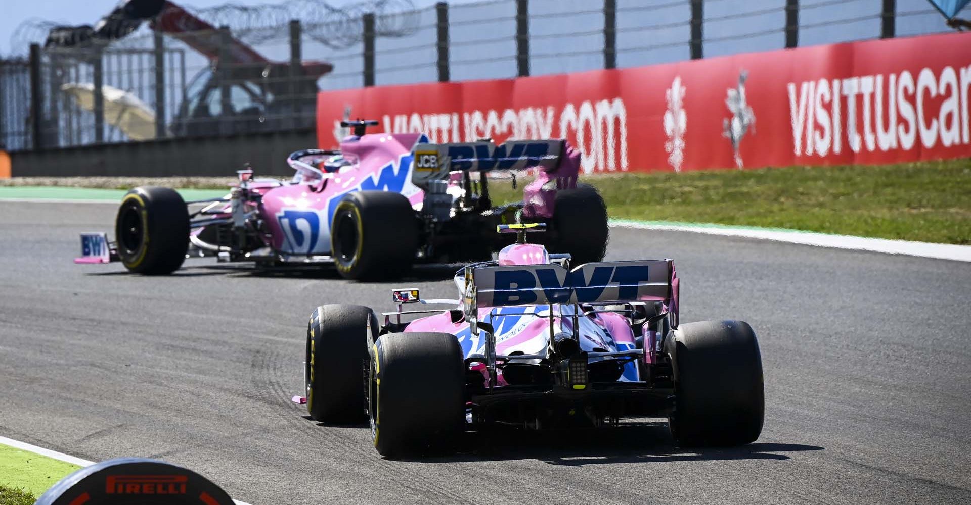 Sergio Perez, Racing Point RP20, leads Lance Stroll, Racing Point RP20