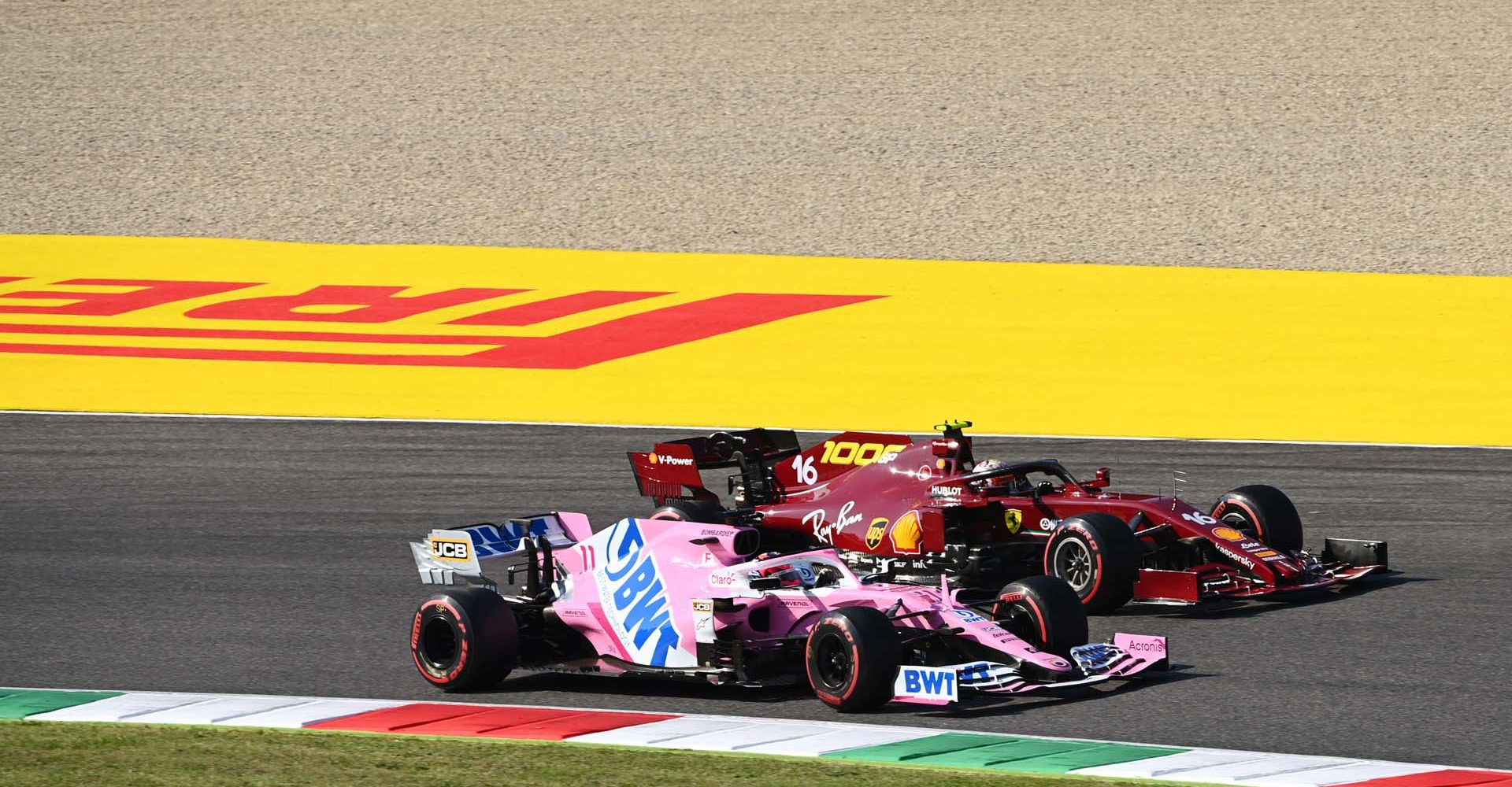 MUGELLO CIRCUIT, ITALY - SEPTEMBER 13: Sergio Perez, Racing Point RP20, battles with Charles Leclerc, Ferrari SF1000 during the Tuscany GP at Mugello Circuit on Sunday September 13, 2020, Italy. (Photo by Mark Sutton / LAT Images)