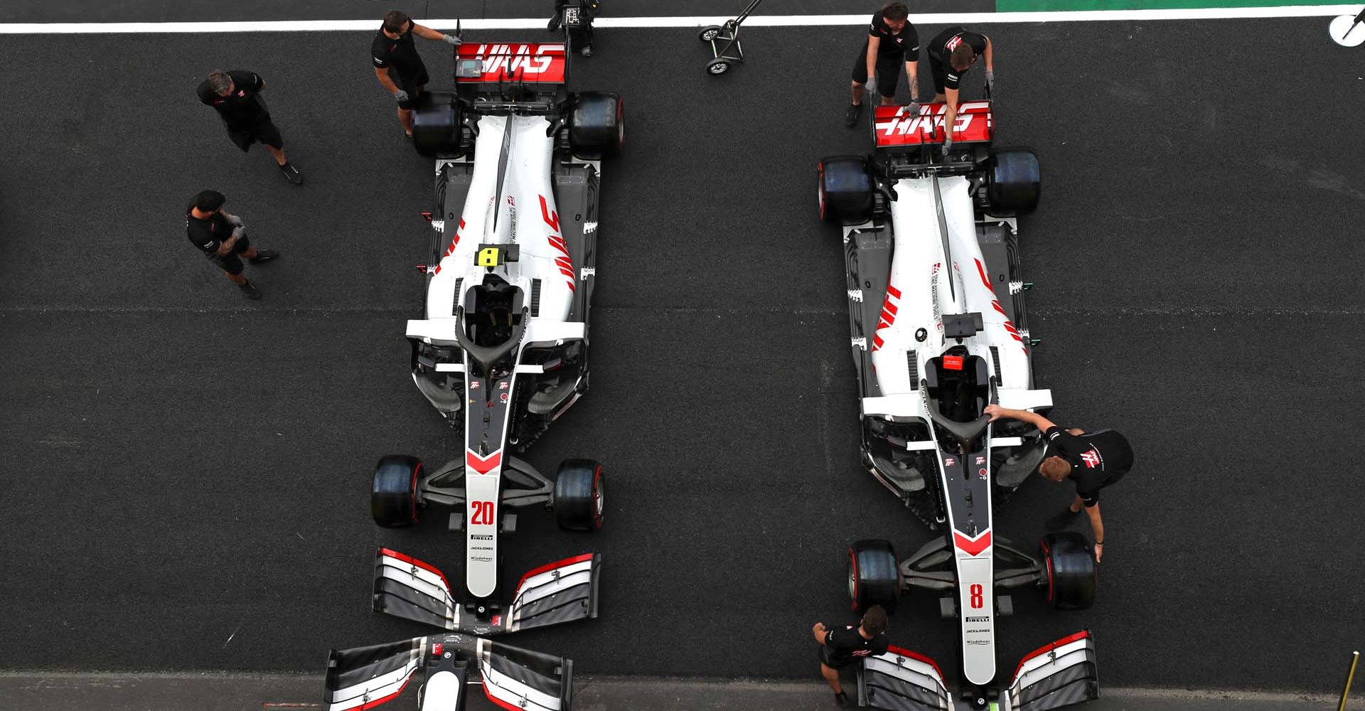 MUGELLO CIRCUIT, ITALY - SEPTEMBER 10: The Kevin Magnussen Haas VF-20 and Romain Grosjean Haas VF-20 in the pit lane during the Tuscany GP at Mugello Circuit on Thursday September 10, 2020, Italy. (Photo by Charles Coates / LAT Images)