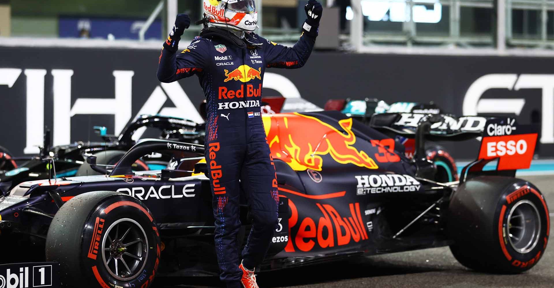 ABU DHABI, UNITED ARAB EMIRATES - DECEMBER 11: Pole position qualifier Max Verstappen of Netherlands and Red Bull Racing celebrates in parc ferme  during qualifying ahead of the F1 Grand Prix of Abu Dhabi at Yas Marina Circuit on December 11, 2021 in Abu Dhabi, United Arab Emirates. (Photo by Bryn Lennon/Getty Images)