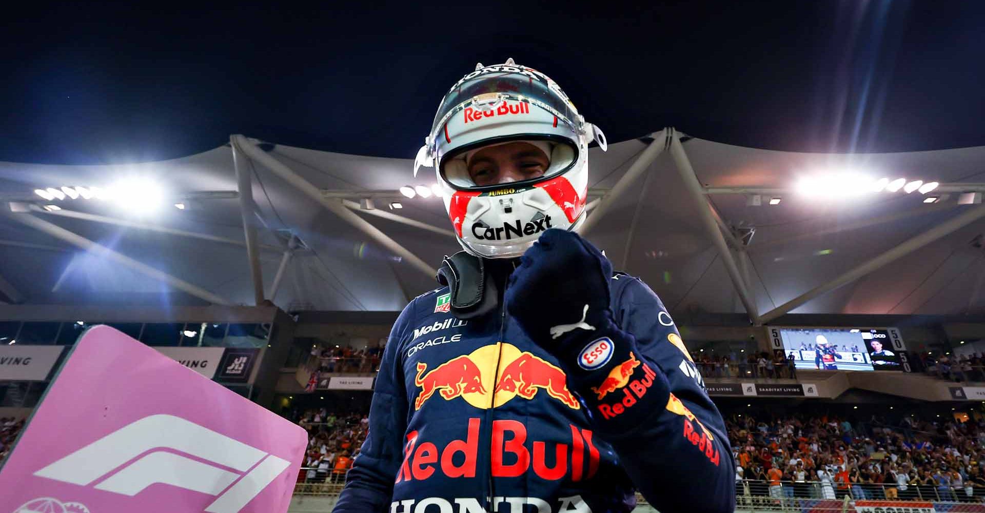 ABU DHABI, UNITED ARAB EMIRATES - DECEMBER 11: Pole position qualifier Max Verstappen of Netherlands and Red Bull Racing celebrates in parc ferme  during qualifying ahead of the F1 Grand Prix of Abu Dhabi at Yas Marina Circuit on December 11, 2021 in Abu Dhabi, United Arab Emirates. (Photo by Mark Thompson/Getty Images)