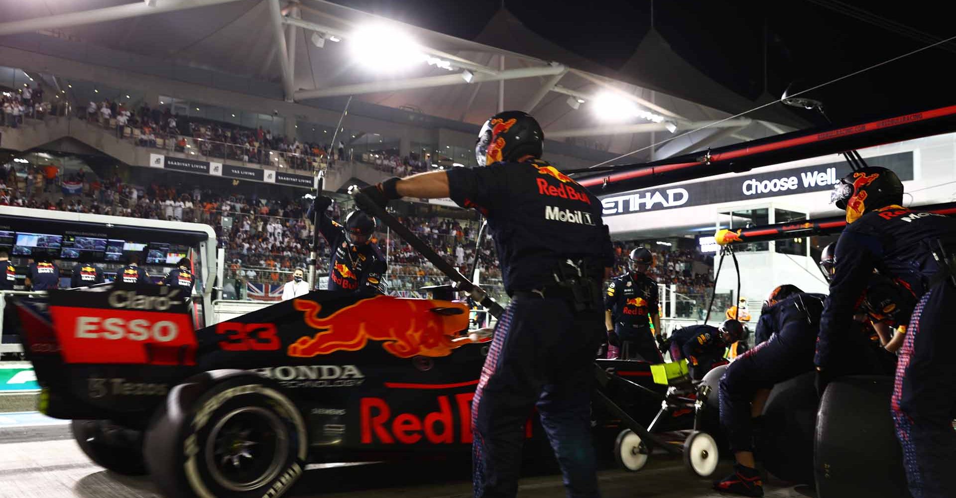 ABU DHABI, UNITED ARAB EMIRATES - DECEMBER 12: Max Verstappen of the Netherlands driving the (33) Red Bull Racing RB16B Honda makes a second pitstop during the F1 Grand Prix of Abu Dhabi at Yas Marina Circuit on December 12, 2021 in Abu Dhabi, United Arab Emirates. (Photo by Mark Thompson/Getty Images)