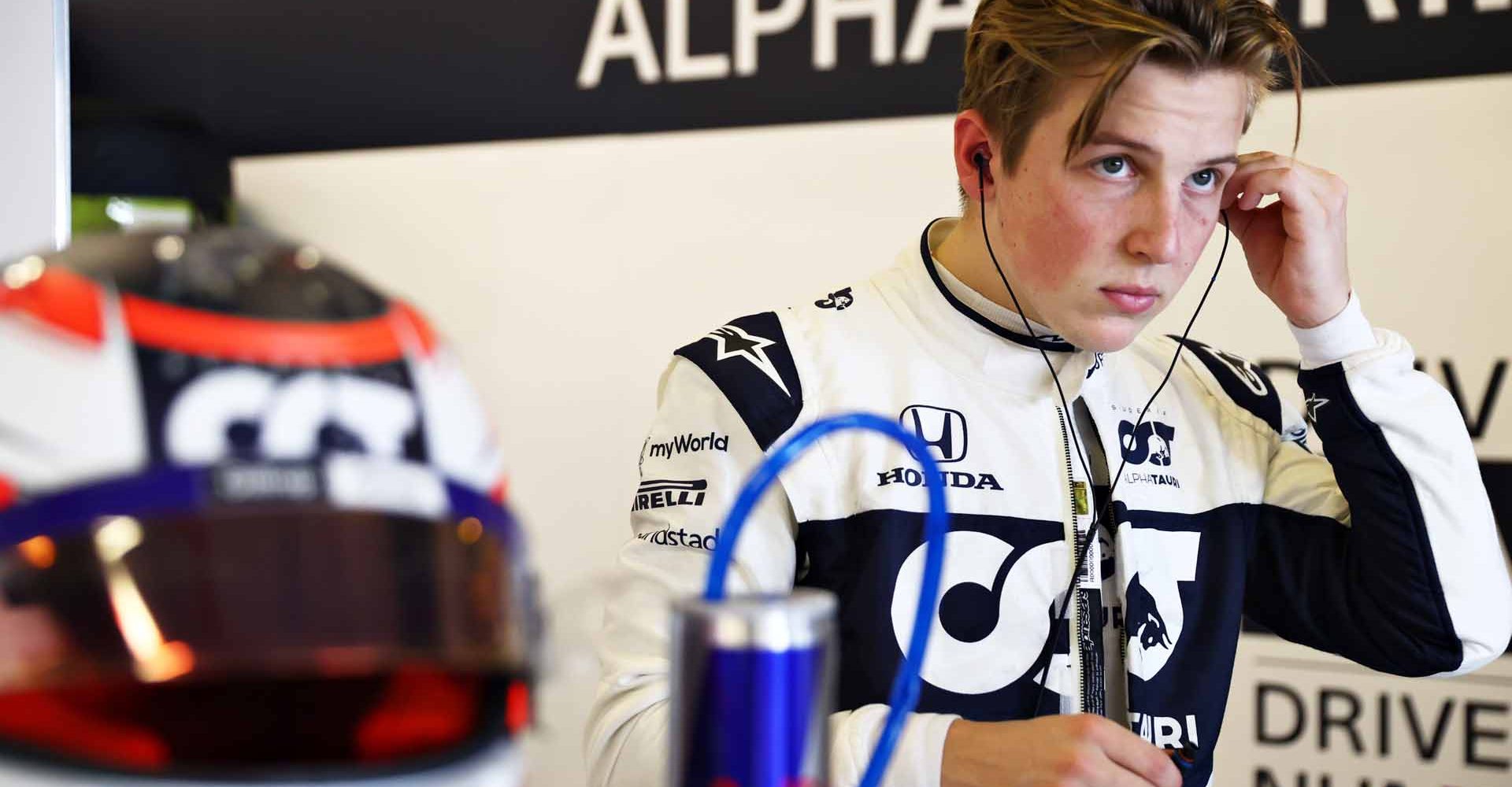 ABU DHABI, UNITED ARAB EMIRATES - DECEMBER 14: Liam Lawson of New Zealand and Scuderia AlphaTauri prepares to drive in the garage during Formula 1 testing at Yas Marina Circuit on December 14, 2021 in Abu Dhabi, United Arab Emirates. (Photo by Clive Rose/Getty Images)