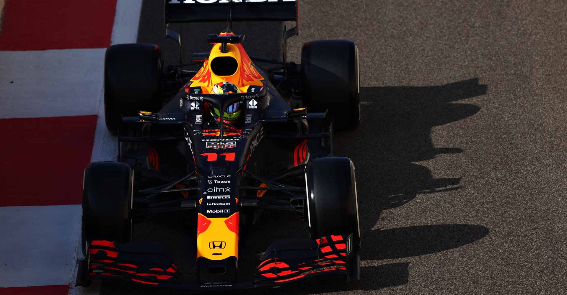 ABU DHABI, UNITED ARAB EMIRATES - DECEMBER 15: Sergio Perez of Mexico driving the (11) Red Bull Racing RB16B Honda during Formula 1 testing at Yas Marina Circuit on December 15, 2021 in Abu Dhabi, United Arab Emirates. (Photo by Clive Rose/Getty Images)