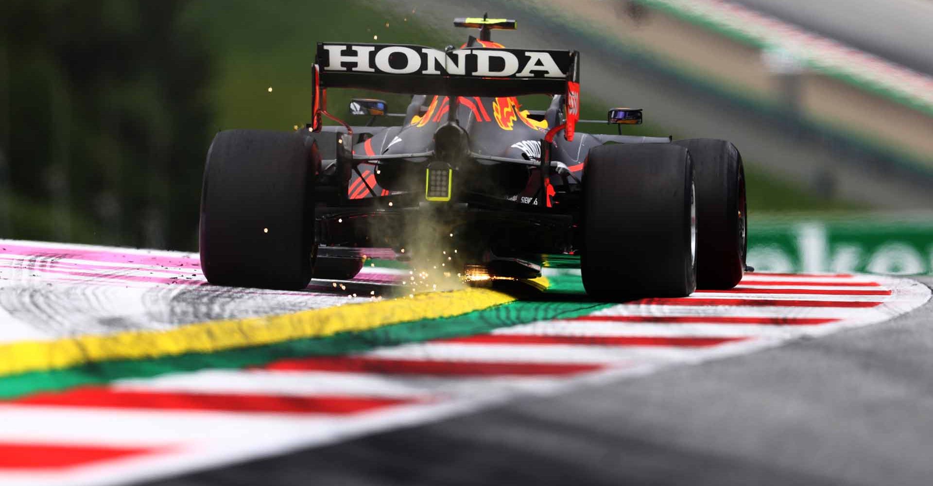 SPIELBERG, AUSTRIA - JULY 02: Sergio Perez of Mexico driving the (11) Red Bull Racing RB16B Honda during practice ahead of the F1 Grand Prix of Austria at Red Bull Ring on July 02, 2021 in Spielberg, Austria. (Photo by Clive Rose/Getty Images)