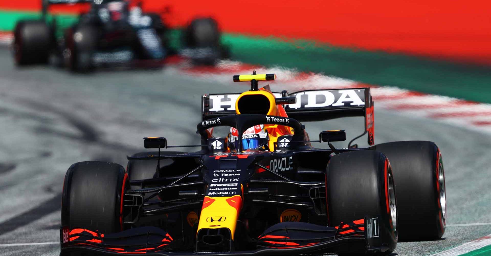 SPIELBERG, AUSTRIA - JULY 03: Sergio Perez of Mexico driving the (11) Red Bull Racing RB16B Honda during qualifying ahead of the F1 Grand Prix of Austria at Red Bull Ring on July 03, 2021 in Spielberg, Austria. (Photo by Bryn Lennon/Getty Images)