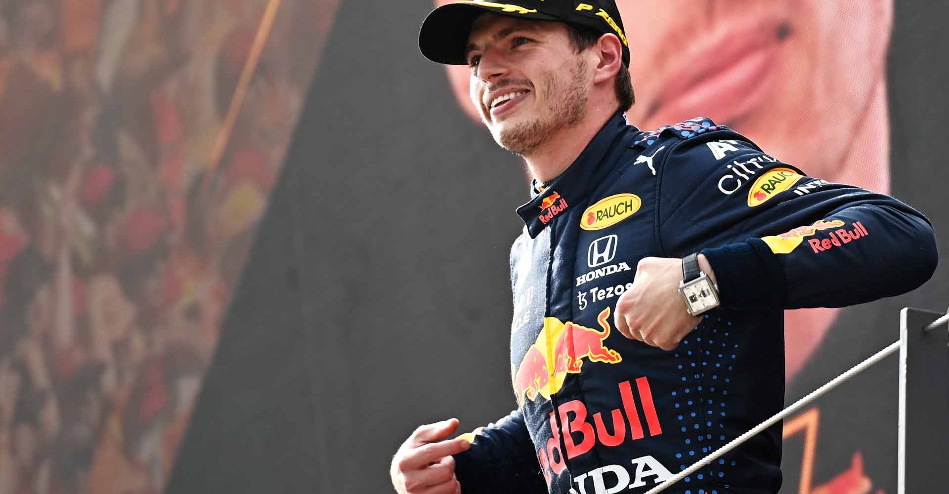 SPIELBERG, AUSTRIA - JULY 04: Race winner Max Verstappen of Netherlands and Red Bull Racing celebrates on the podium during the F1 Grand Prix of Austria at Red Bull Ring on July 04, 2021 in Spielberg, Austria. (Photo by Christian Bruna - Pool/Getty Images)