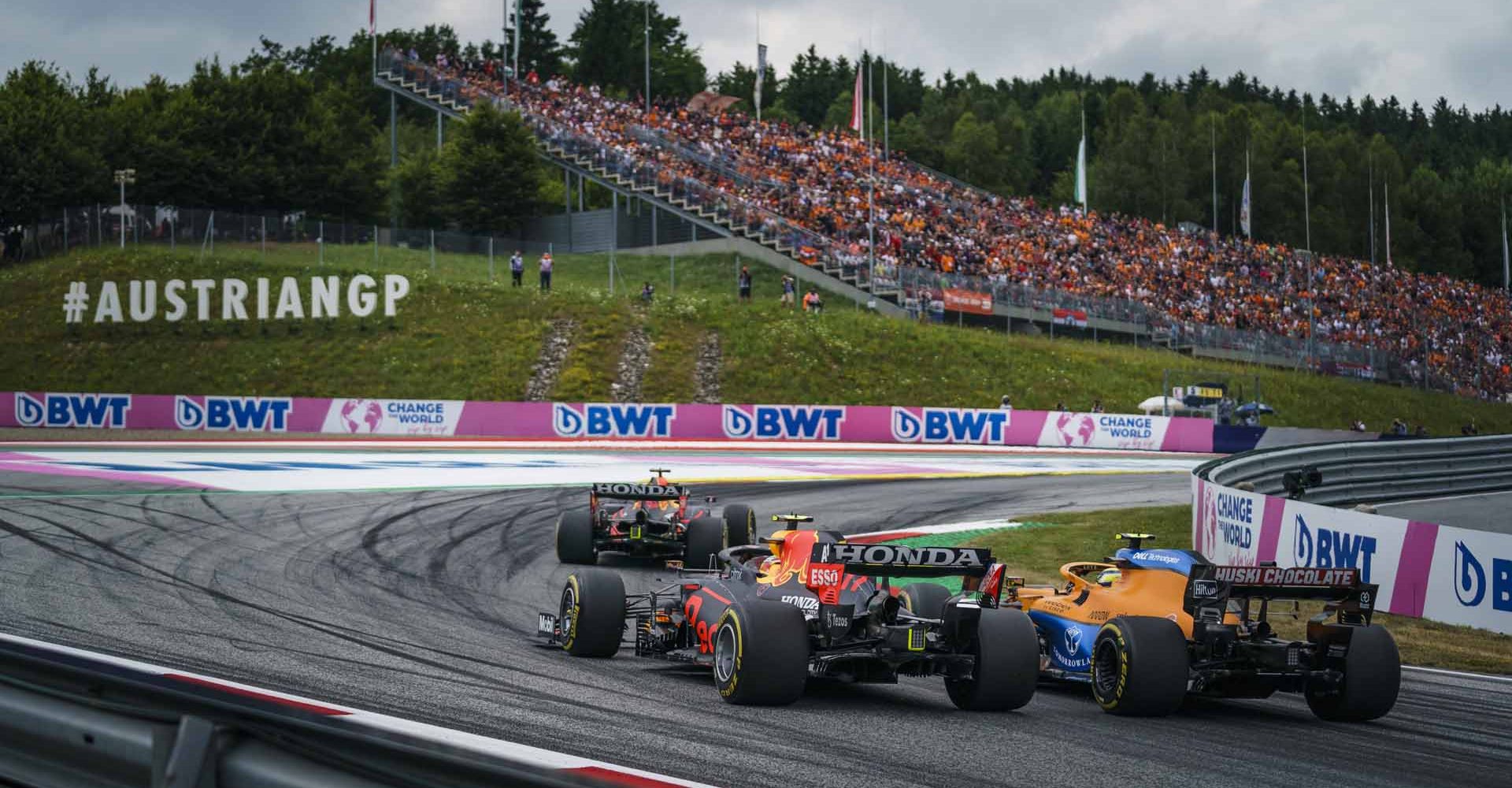 Sergio Perez races against Lando Norris during the FIA Formula One World Championship 2021 in Spielberg, Austria on July 4, 2021