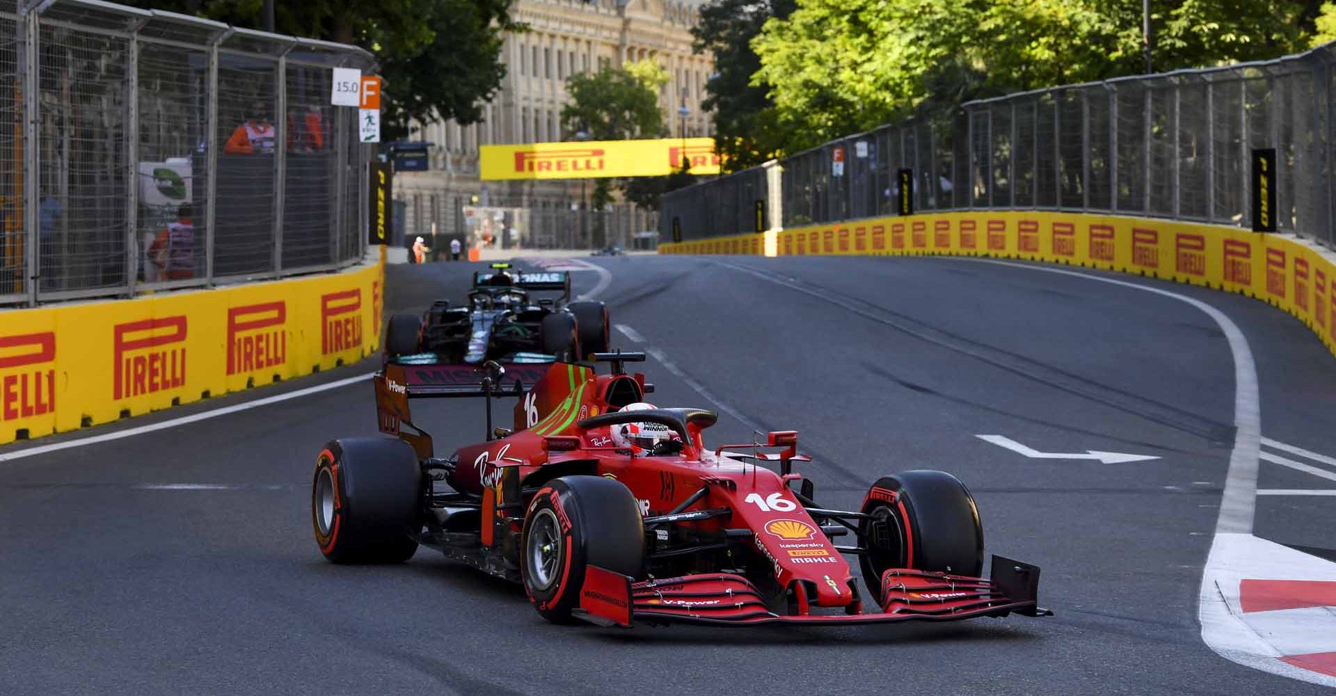 BAKU CITY CIRCUIT, AZERBAIJAN - JUNE 05: Charles Leclerc, Ferrari SF21, leads Valtteri Bottas, Mercedes W12 during the Azerbaijan GP at Baku City Circuit on Saturday June 05, 2021 in Baku, Azerbaijan. (Photo by Mark Sutton / LAT Images)