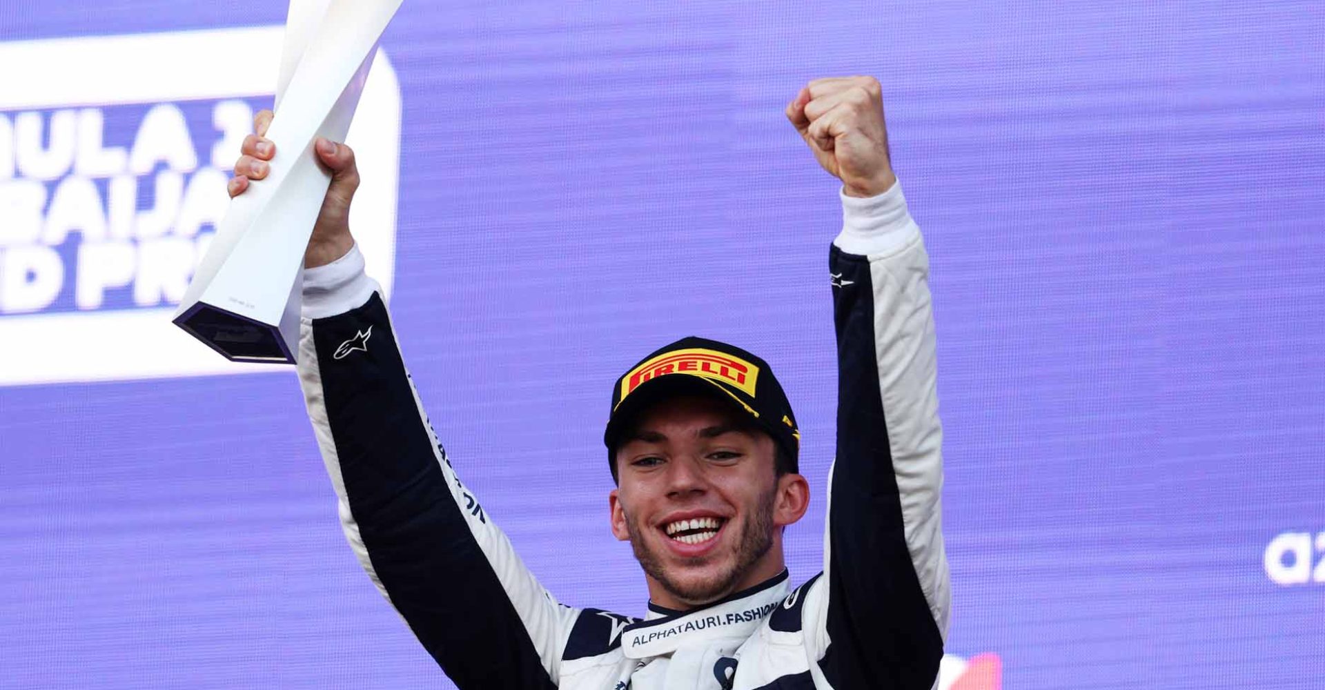 BAKU, AZERBAIJAN - JUNE 06: Third placed Pierre Gasly of France and Scuderia AlphaTauri celebrates on the podium during the F1 Grand Prix of Azerbaijan at Baku City Circuit on June 06, 2021 in Baku, Azerbaijan. (Photo by Clive Rose/Getty Images)