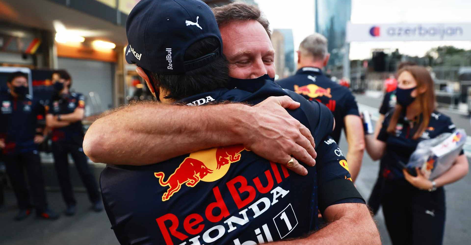 BAKU, AZERBAIJAN - JUNE 06: Race winner Sergio Perez of Mexico and Red Bull Racing celebrates with Red Bull Racing Team Principal Christian Horner after the F1 Grand Prix of Azerbaijan at Baku City Circuit on June 06, 2021 in Baku, Azerbaijan. (Photo by Mark Thompson/Getty Images)