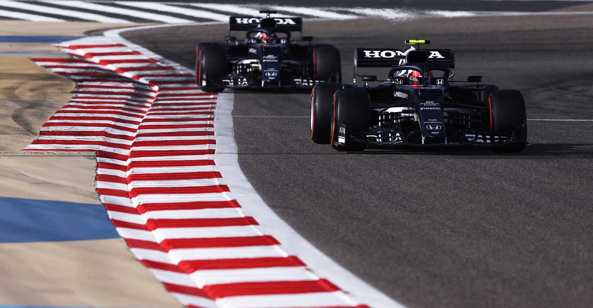 BAHRAIN, BAHRAIN - MARCH 27: Pierre Gasly of France driving the (10) Scuderia AlphaTauri AT02 Honda leads Yuki Tsunoda of Japan driving the (22) Scuderia AlphaTauri AT02 Honda on track during final practice ahead of the F1 Grand Prix of Bahrain at Bahrain International Circuit on March 27, 2021 in Bahrain, Bahrain. (Photo by Lars Baron/Getty Images)