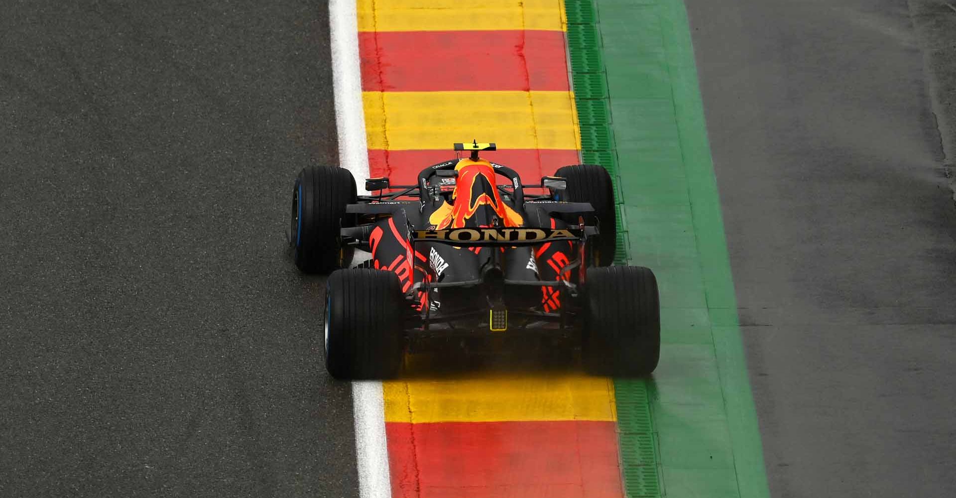 SPA, BELGIUM - AUGUST 28: Sergio Perez of Mexico driving the (11) Red Bull Racing RB16B Honda during qualifying ahead of the F1 Grand Prix of Belgium at Circuit de Spa-Francorchamps on August 28, 2021 in Spa, Belgium. (Photo by Dan Mullan/Getty Images)