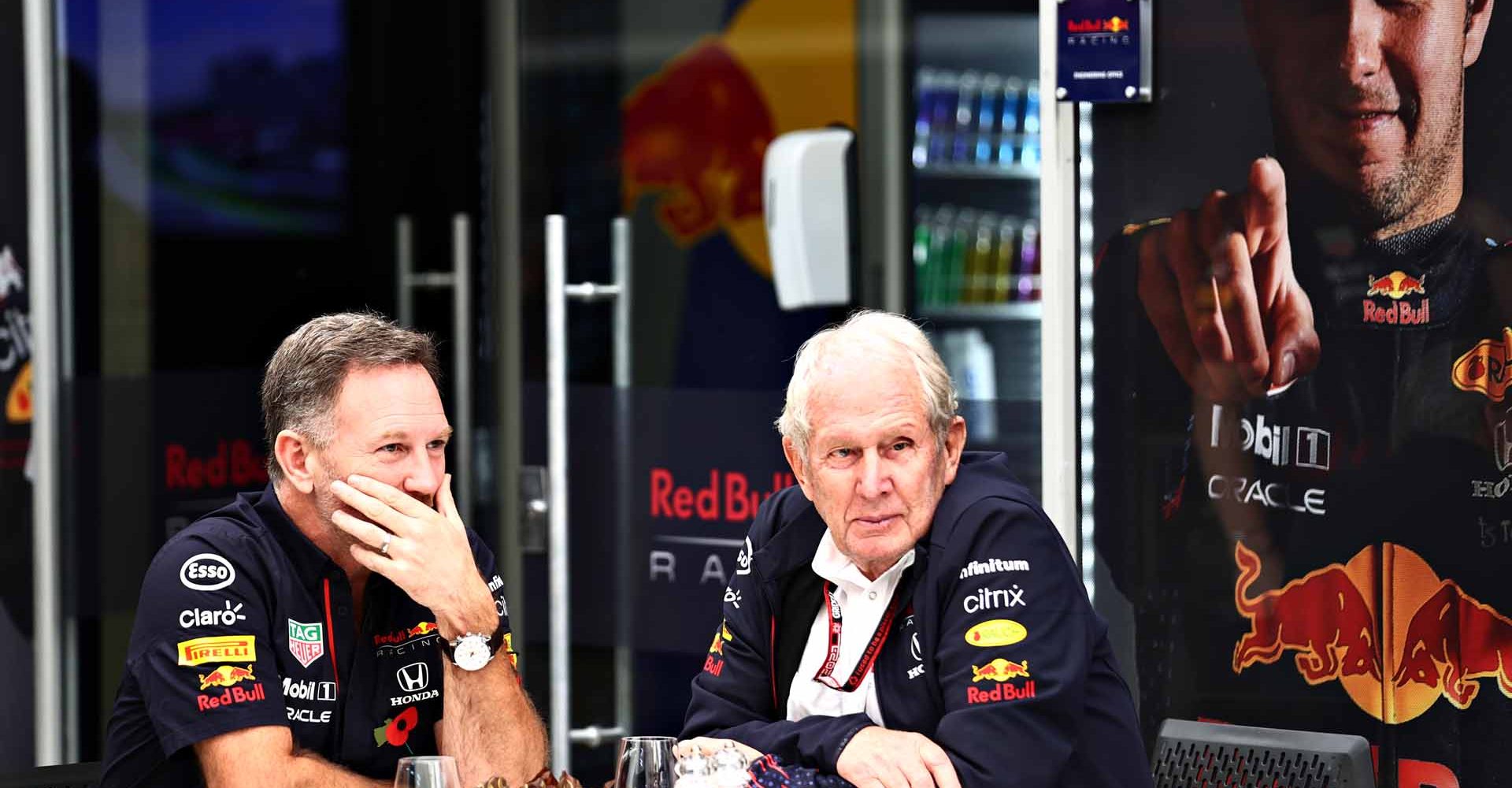 SAO PAULO, BRAZIL - NOVEMBER 13: Red Bull Racing Team Principal Christian Horner and Red Bull Racing Team Consultant Dr Helmut Marko look on in the Paddock during practice ahead of the F1 Grand Prix of Brazil at Autodromo Jose Carlos Pace on November 13, 2021 in Sao Paulo, Brazil. (Photo by Mark Thompson/Getty Images)