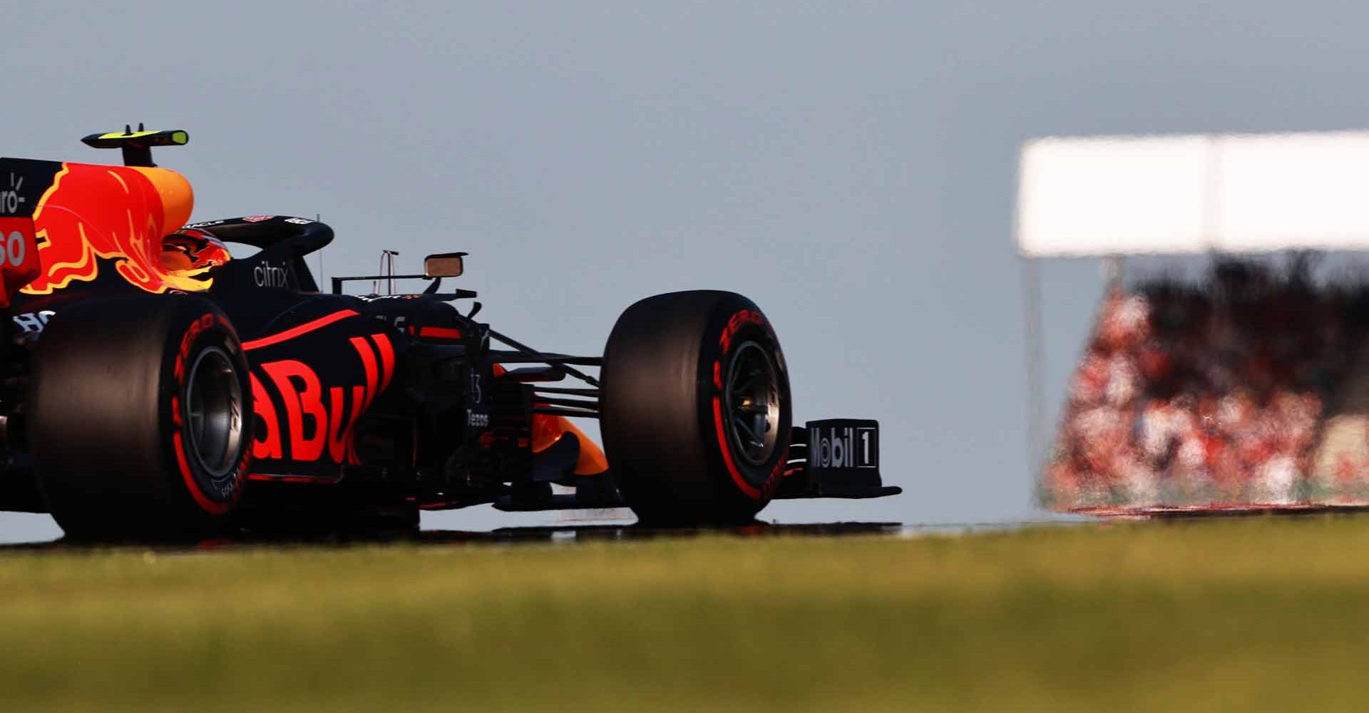 NORTHAMPTON, ENGLAND - JULY 16: Sergio Perez of Mexico driving the (11) Red Bull Racing RB16B Honda during qualifying ahead of the F1 Grand Prix of Great Britain at Silverstone on July 16, 2021 in Northampton, England. (Photo by Mark Thompson/Getty Images)