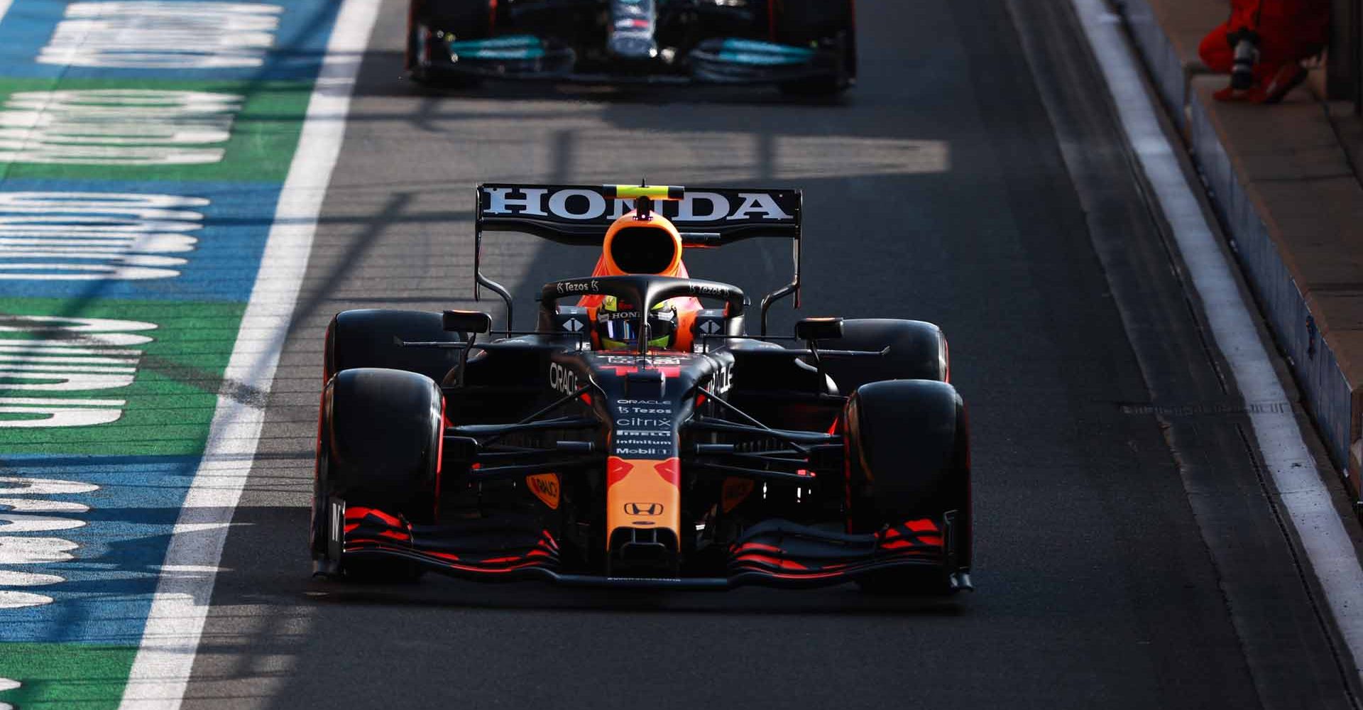 NORTHAMPTON, ENGLAND - JULY 16: Sergio Perez of Mexico driving the (11) Red Bull Racing RB16B Honda in the Pitlane during qualifying ahead of the F1 Grand Prix of Great Britain at Silverstone on July 16, 2021 in Northampton, England. (Photo by Mark Thompson/Getty Images)