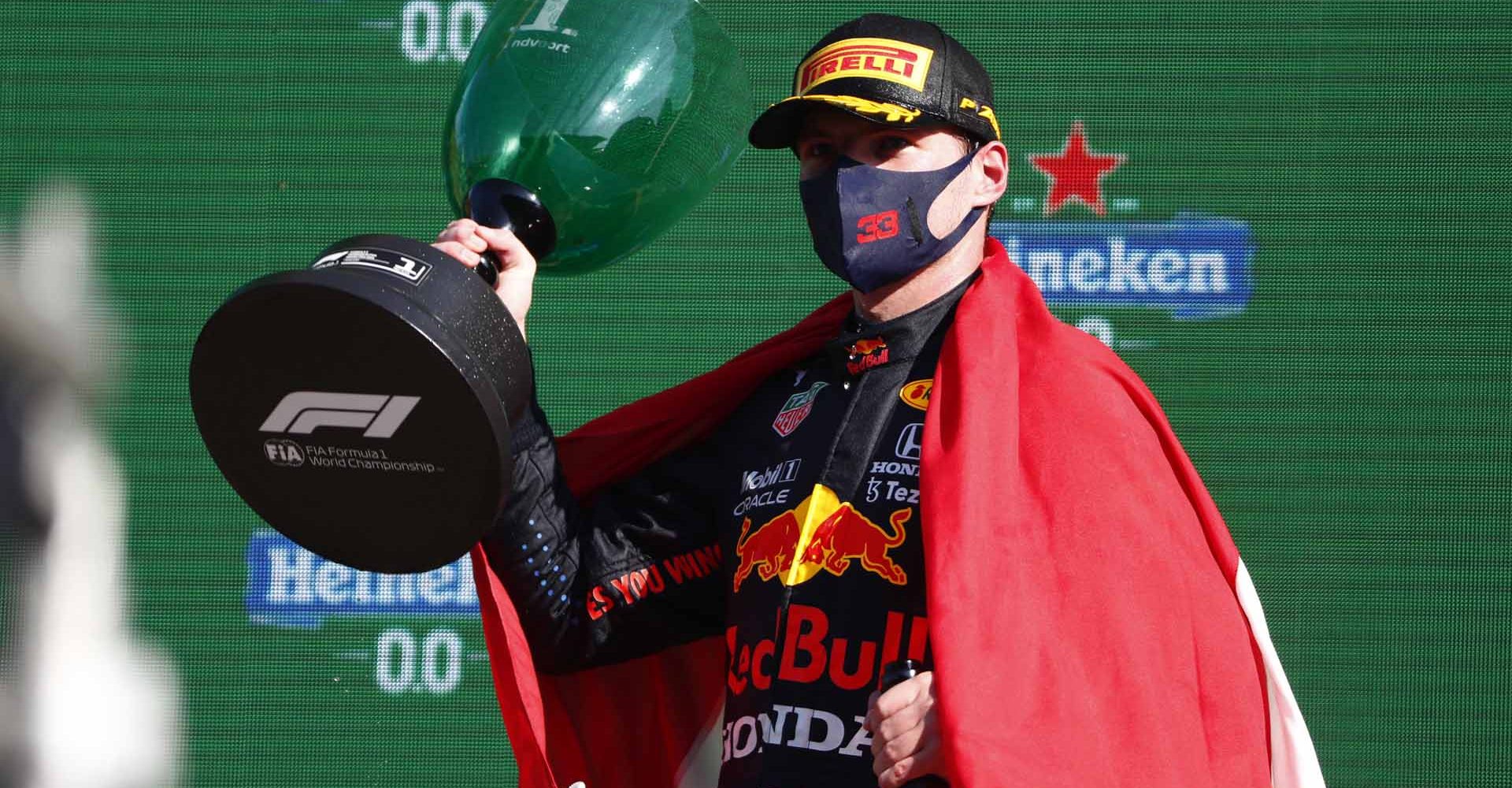 CIRCUIT ZANDVOORT, NETHERLANDS - SEPTEMBER 05: Max Verstappen, Red Bull Racing, 1st position, on the podium with his trophy during the Dutch GP at Circuit Zandvoort on Sunday September 05, 2021 in North Holland, Netherlands. (Photo by Sam Bloxham / LAT Images)