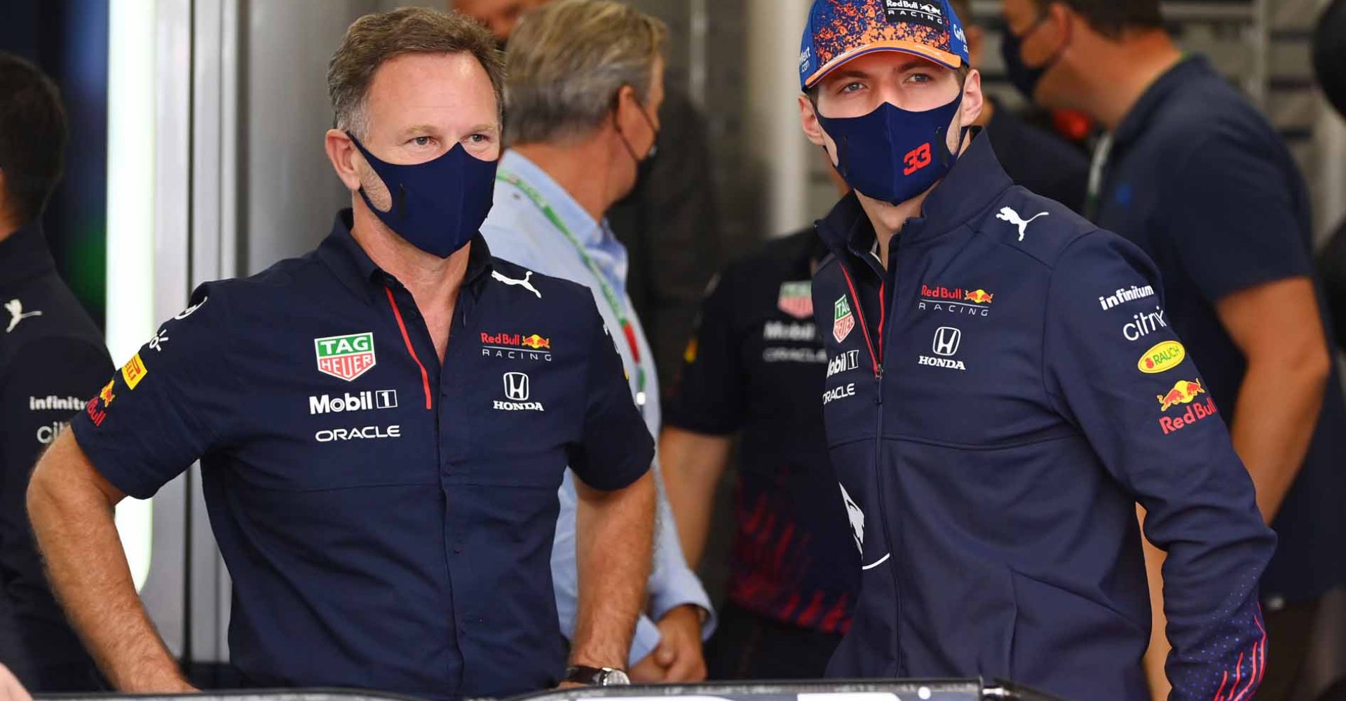 ZANDVOORT, NETHERLANDS - SEPTEMBER 05: Red Bull Racing Team Principal Christian Horner and Max Verstappen of Netherlands and Red Bull Racing talk in the garage ahead of during the F1 Grand Prix of The Netherlands at Circuit Zandvoort on September 05, 2021 in Zandvoort, Netherlands. (Photo by Dan Mullan/Getty Images)