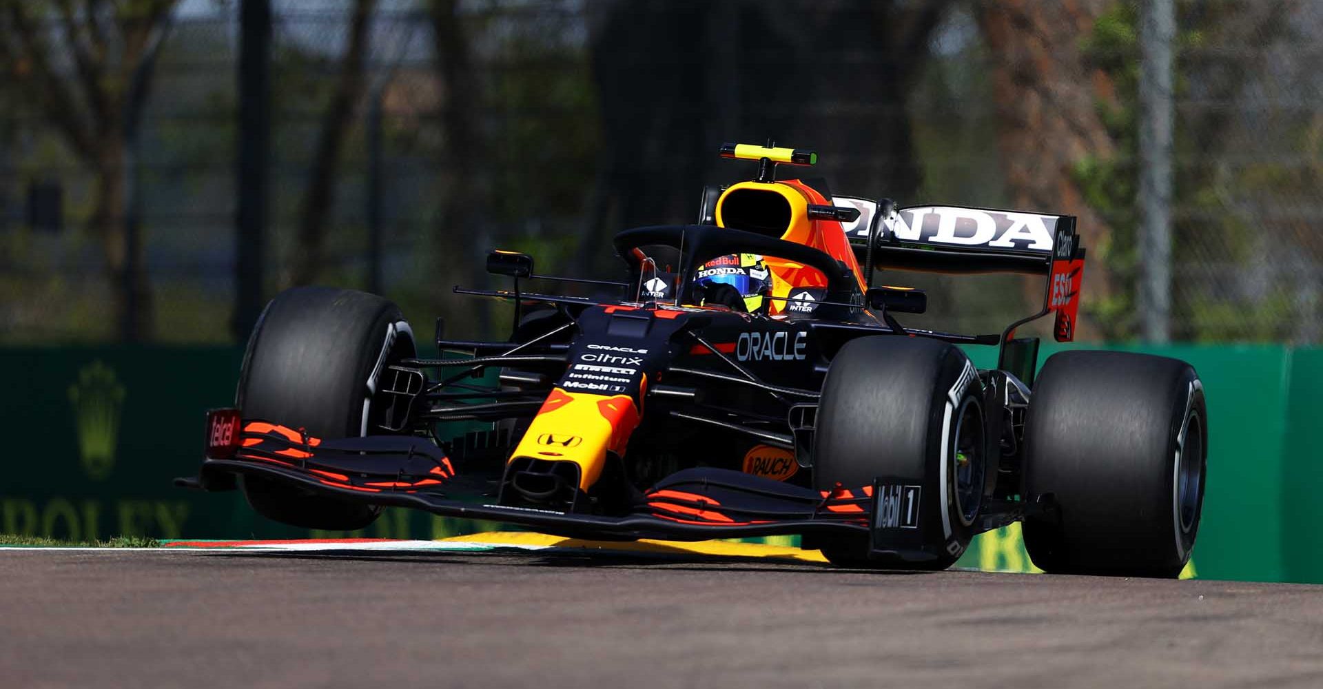 IMOLA, ITALY - APRIL 16: Sergio Perez of Mexico driving the (11) Red Bull Racing RB16B Honda on track during practice ahead of the F1 Grand Prix of Emilia Romagna at Autodromo Enzo e Dino Ferrari on April 16, 2021 in Imola, Italy. (Photo by Bryn Lennon/Getty Images)